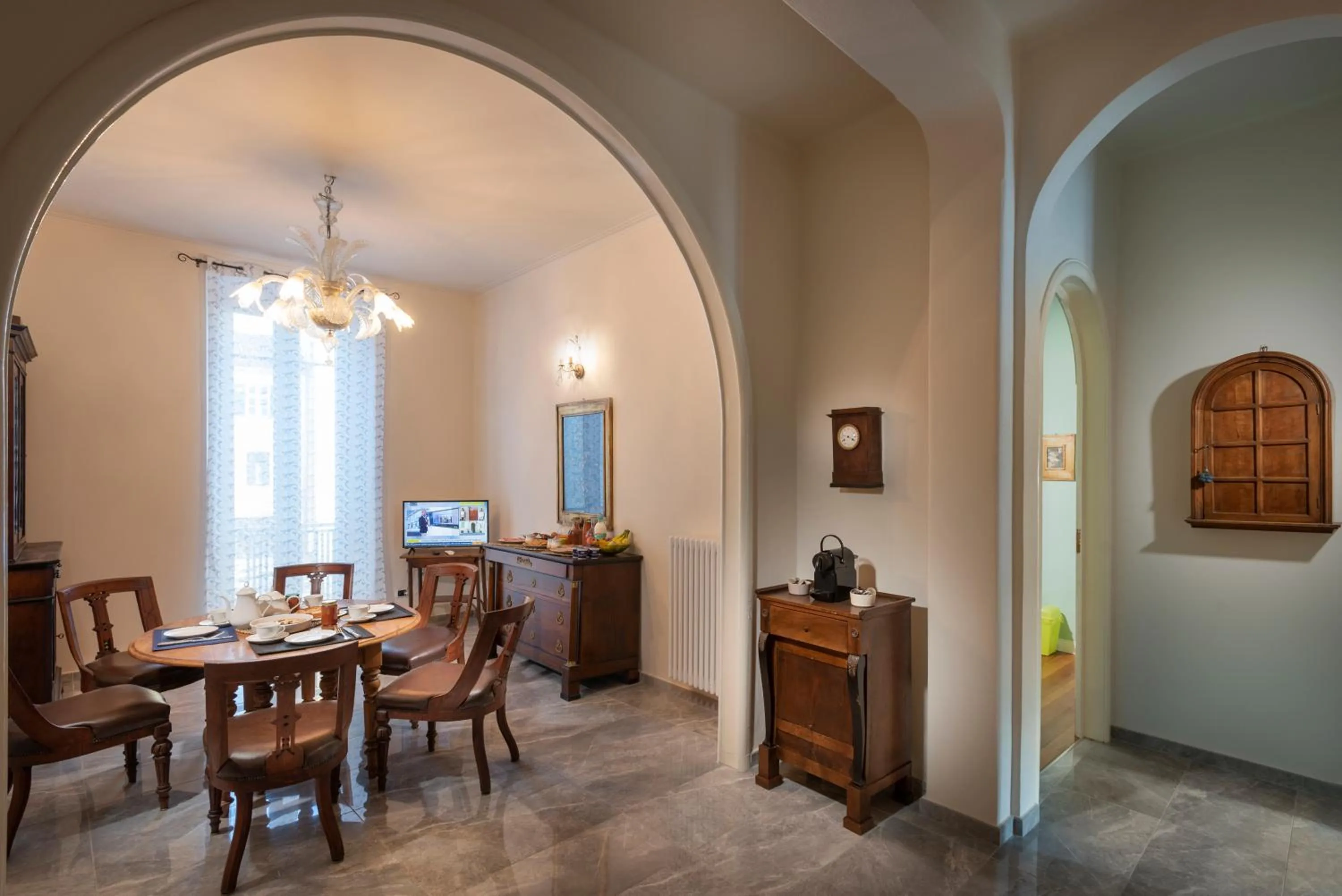 Communal lounge/ TV room in Porte ad Arco