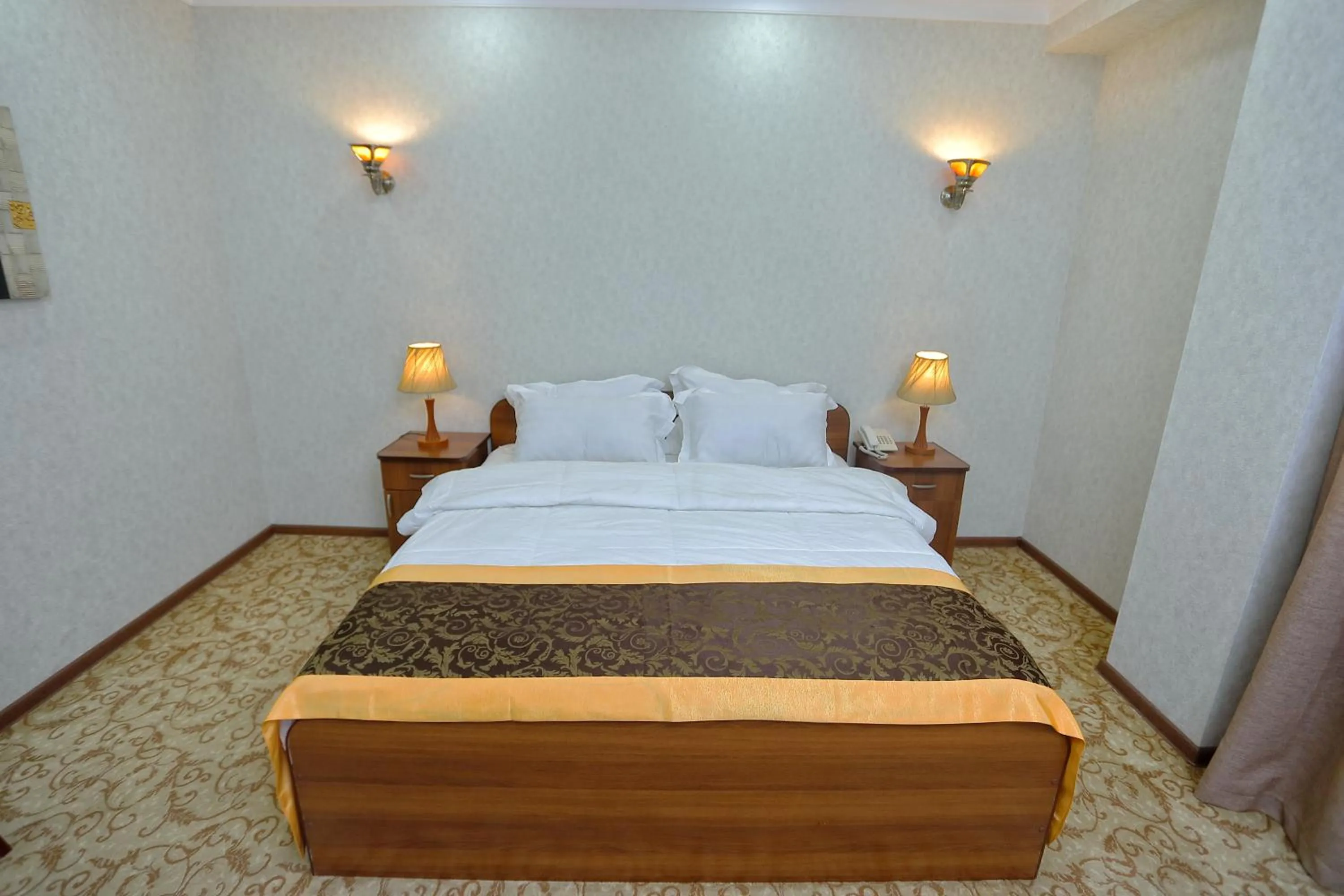 Bed in VIARDO Hotel