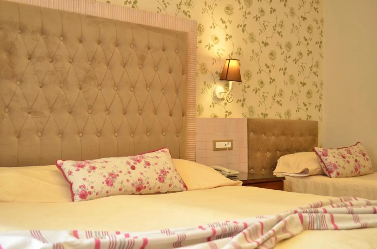 Bed in Olympic Hotel