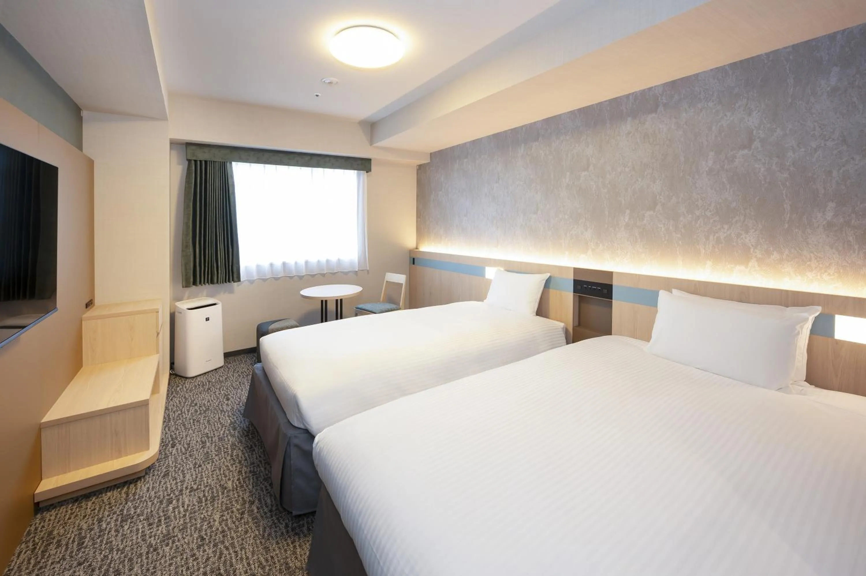 Bed in Hotel Lumiere Nishikasai