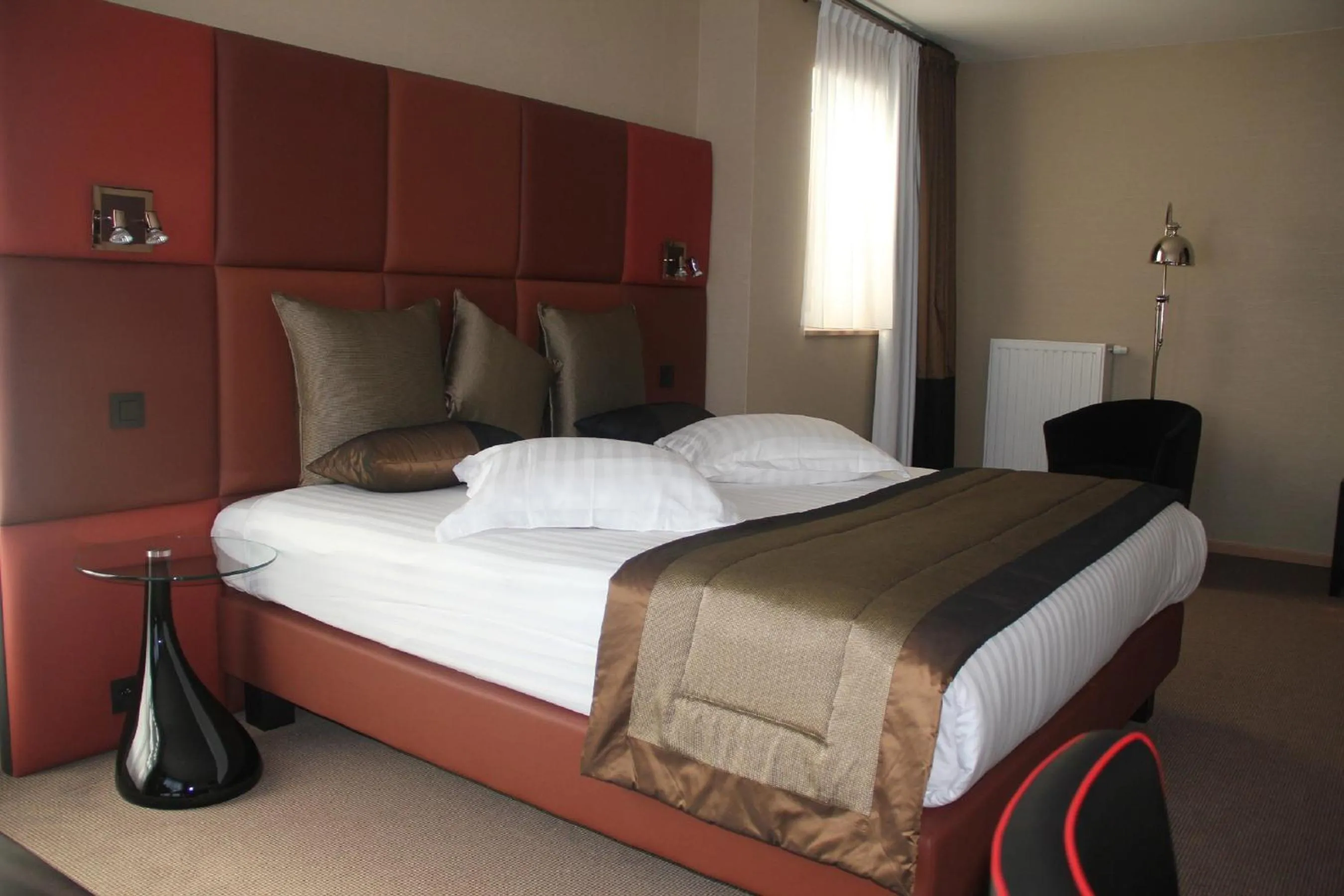 Bed in Hotel La Roseraie