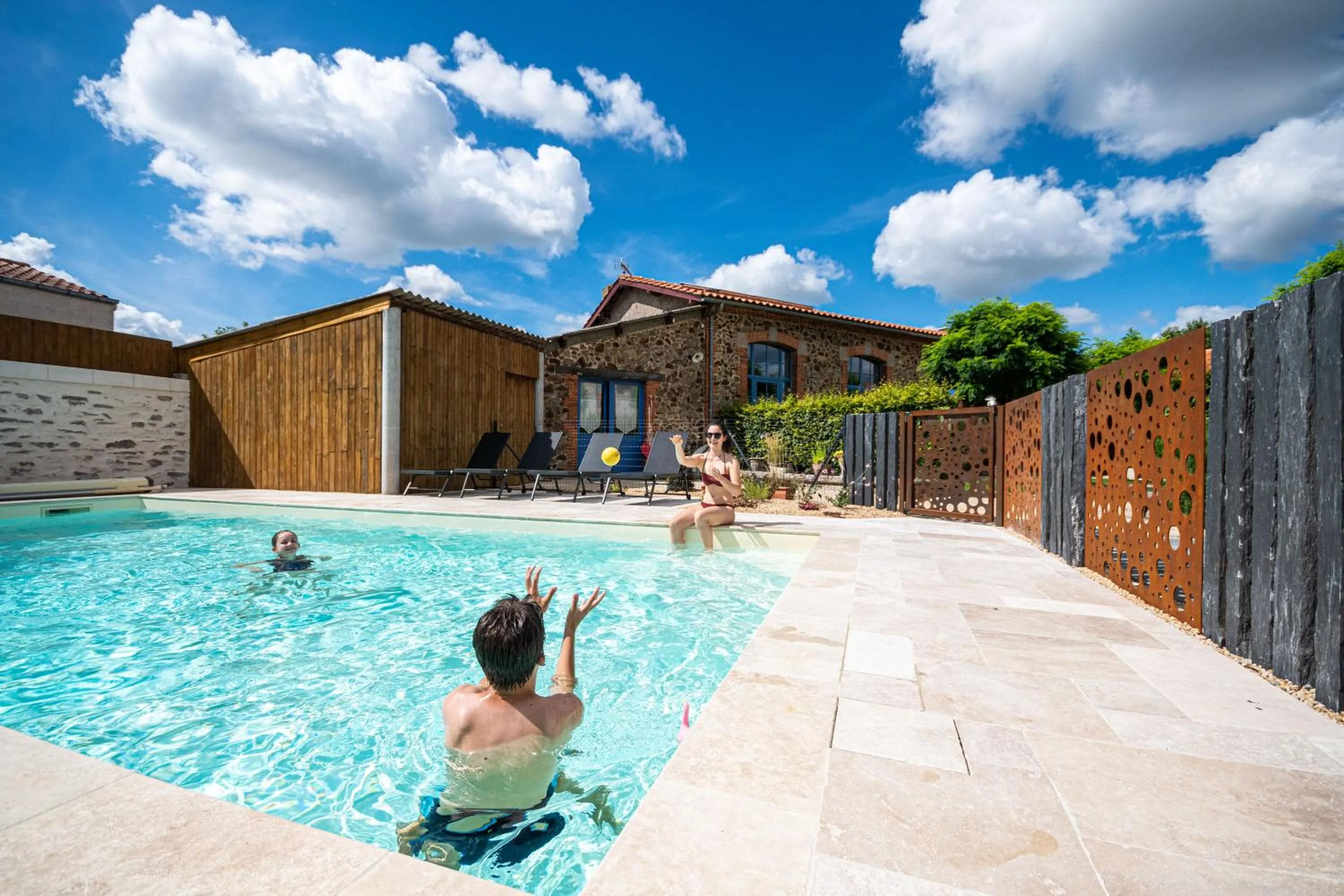 Swimming pool in Le DOMAINE DES ECOLIERS B&B