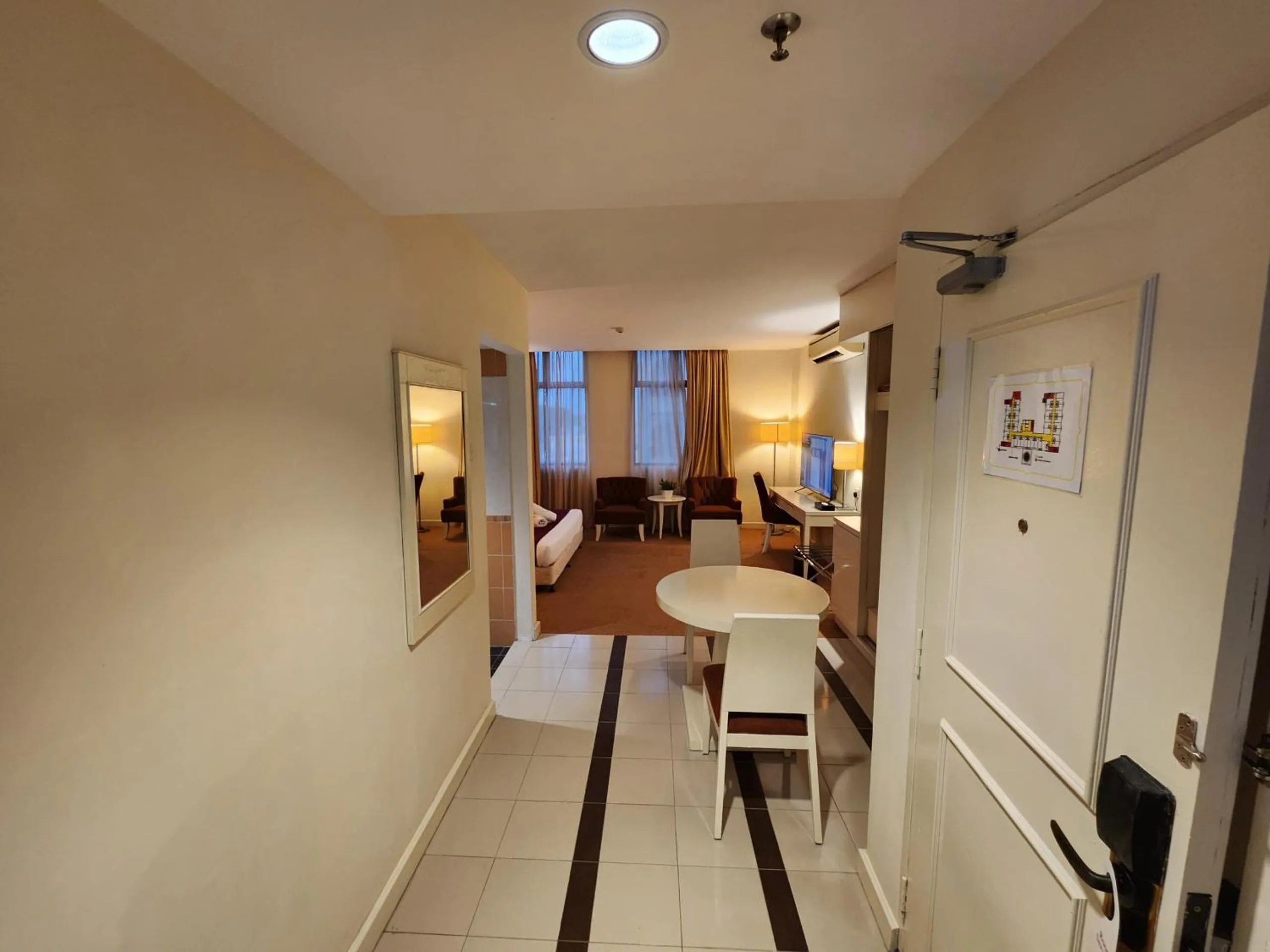 Bed in The Grand Puteri Hotel