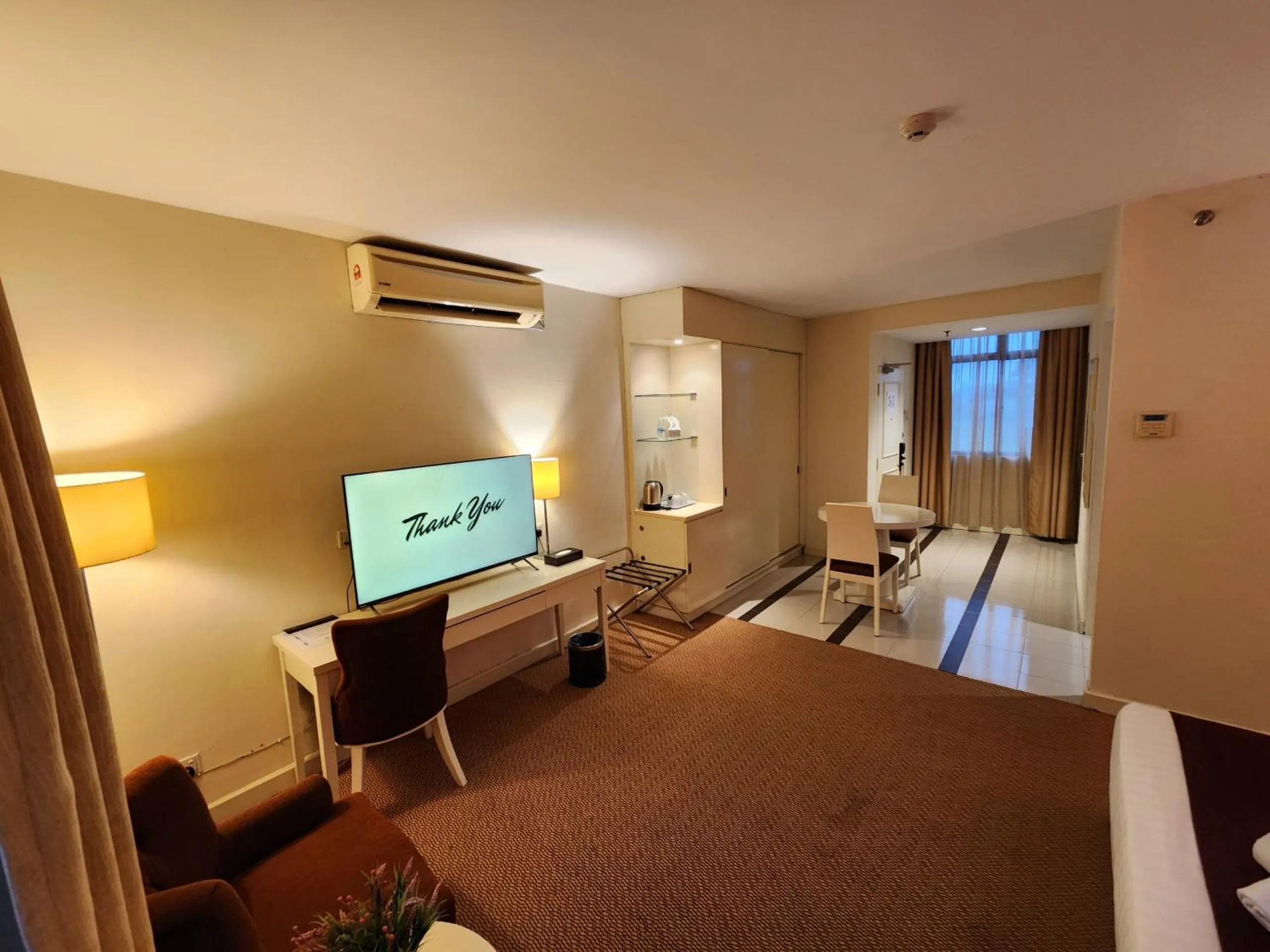 Bed in The Grand Puteri Hotel