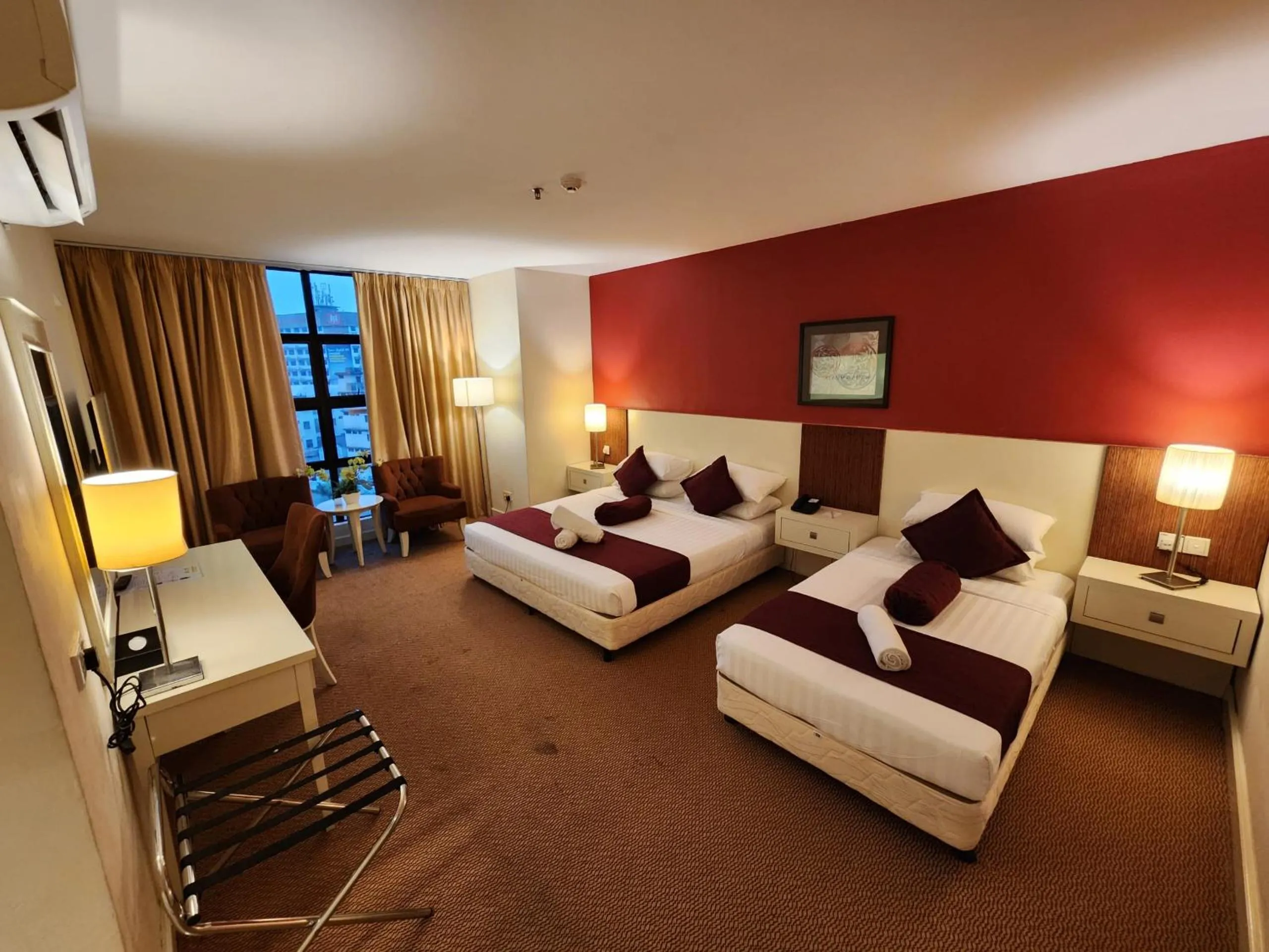 Bed in The Grand Puteri Hotel