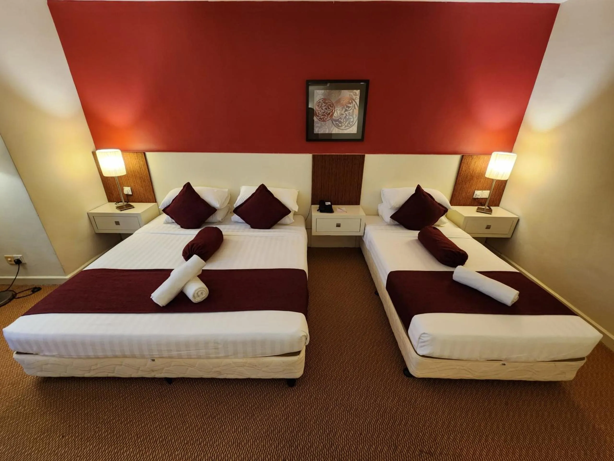 Bed in The Grand Puteri Hotel