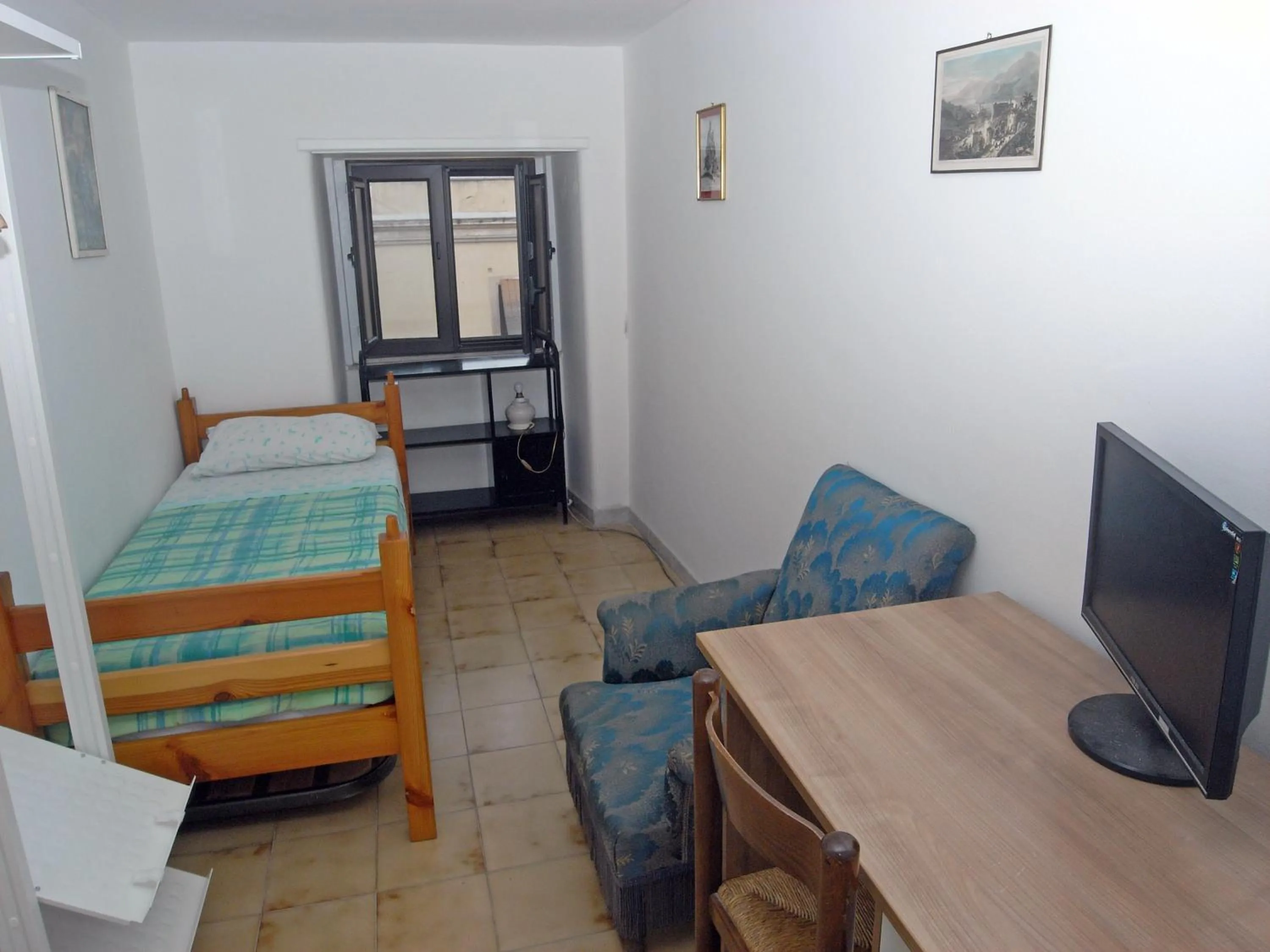 Photo of the whole room, Bed in AG HOME ADRAGNA