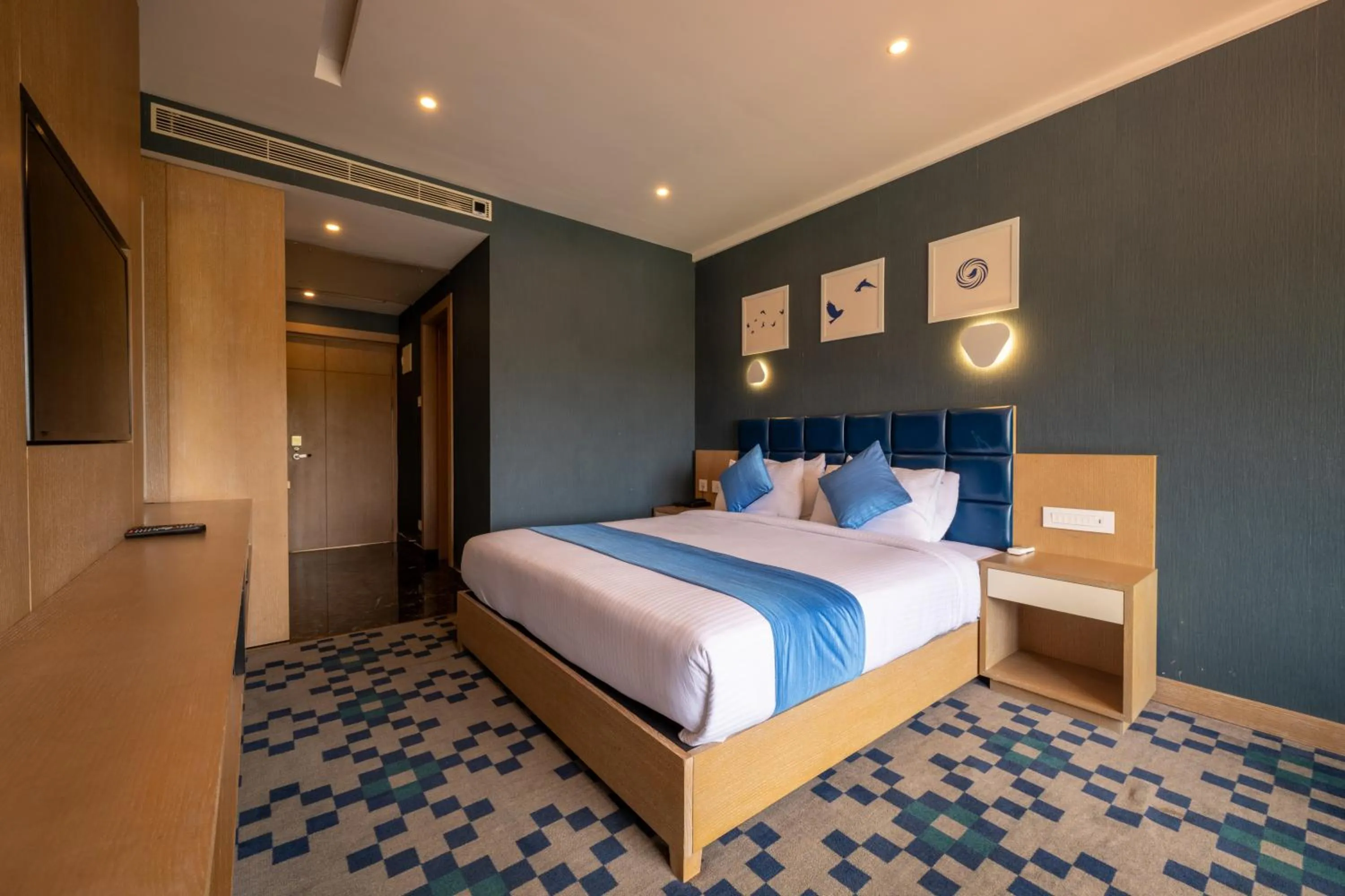 Bed in Mintotel Wayanad