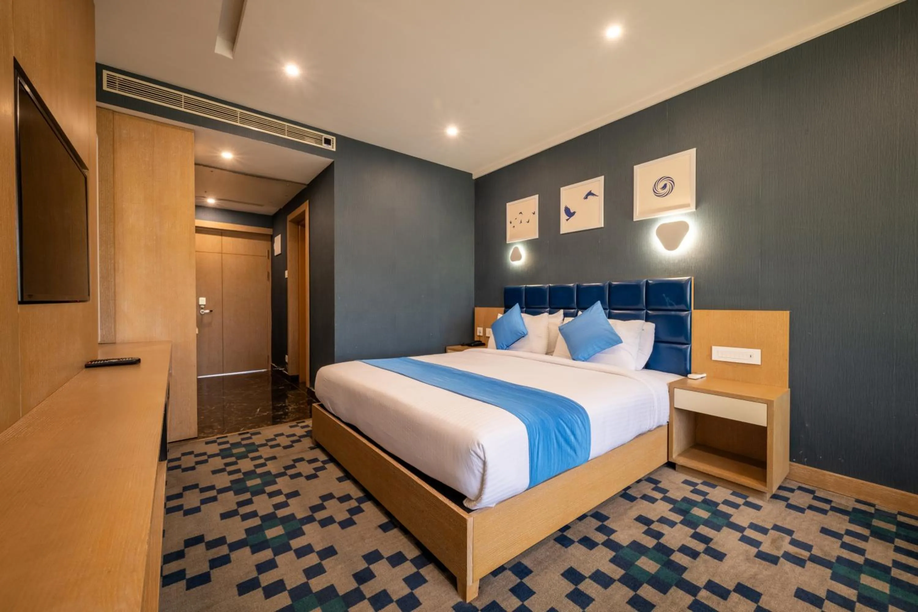 Photo of the whole room, Bed in Mintotel Wayanad