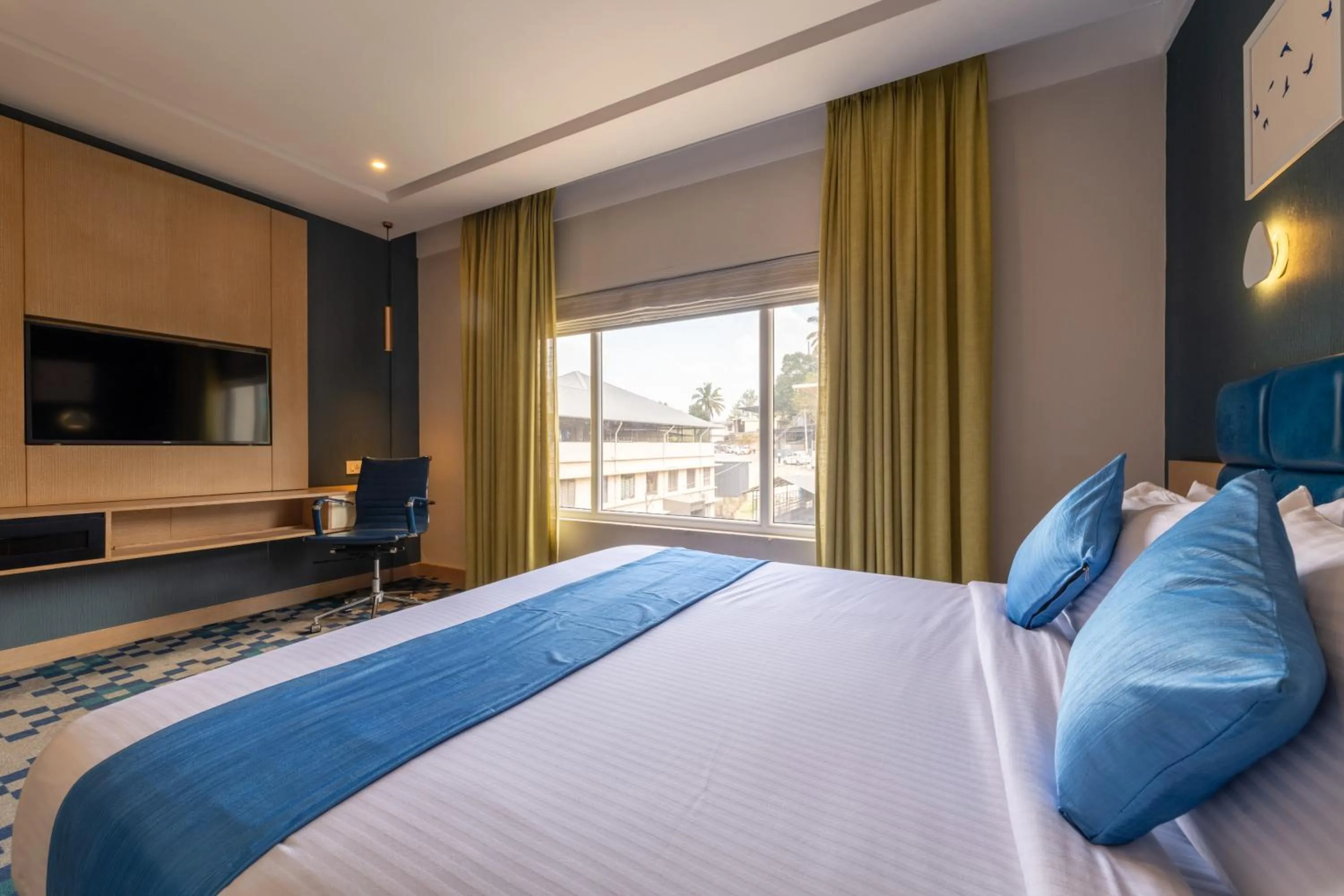 Photo of the whole room, Bed in Mintotel Wayanad