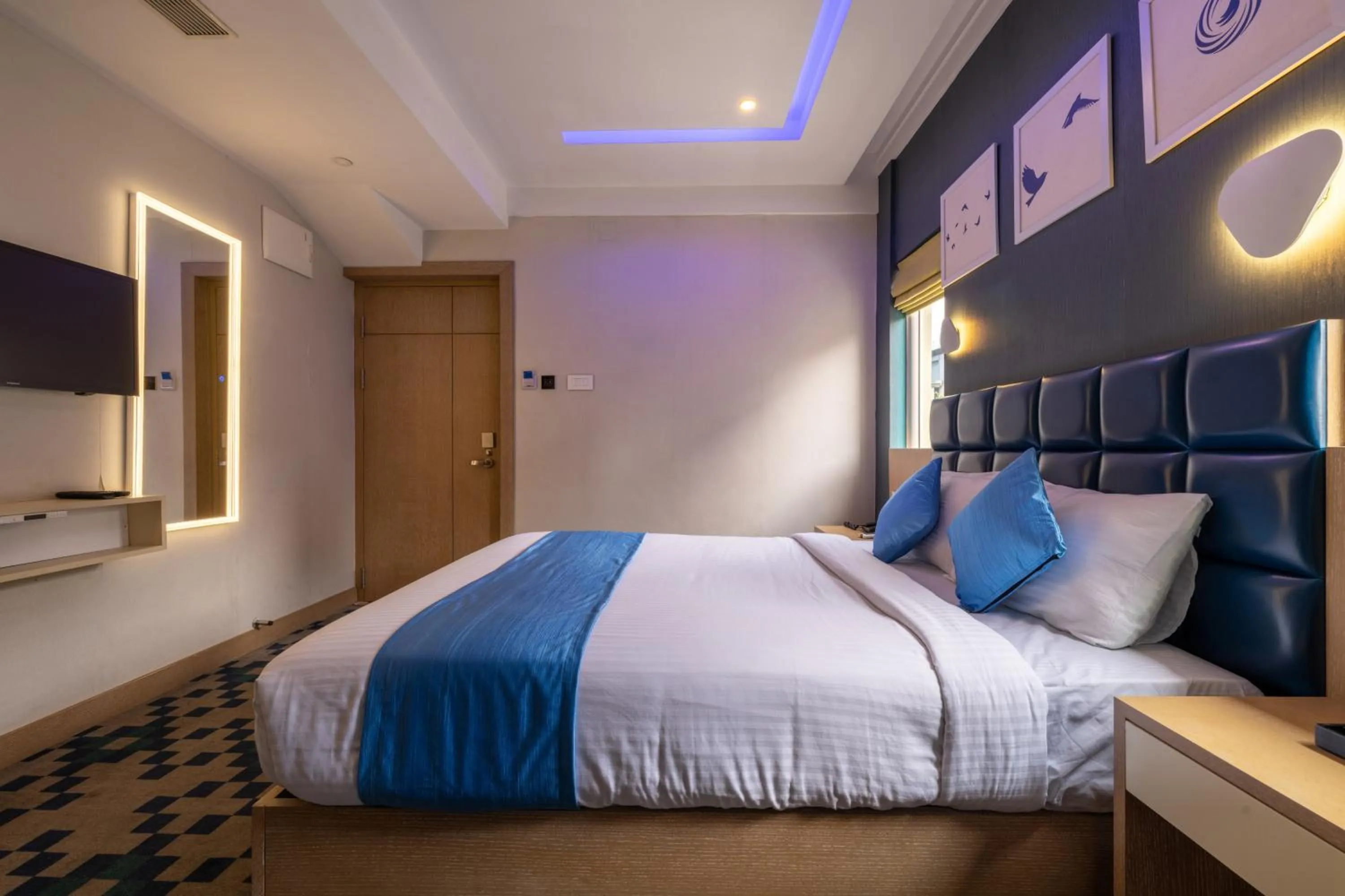 Photo of the whole room, Bed in Mintotel Wayanad