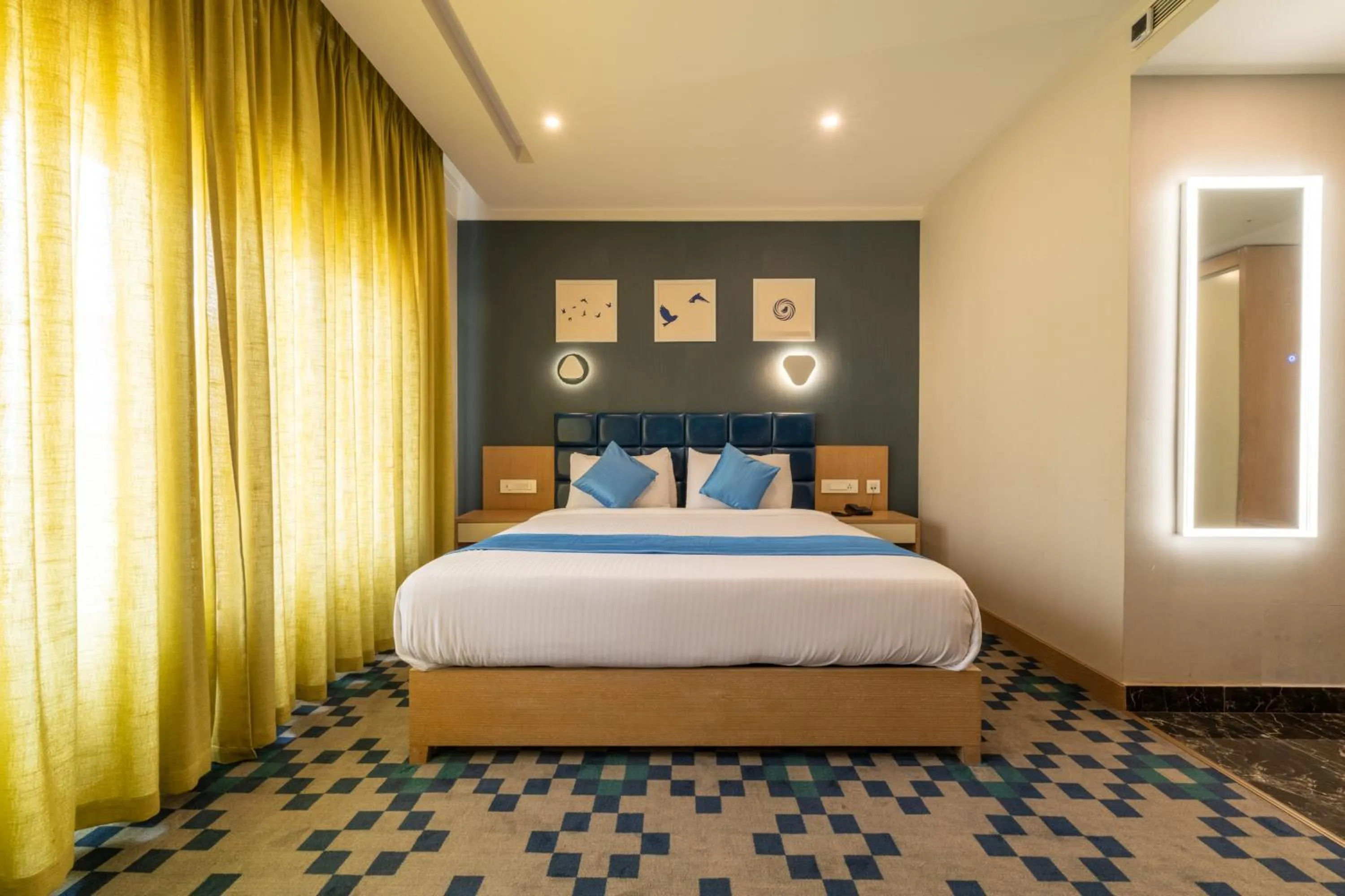 Bed in Mintotel Wayanad