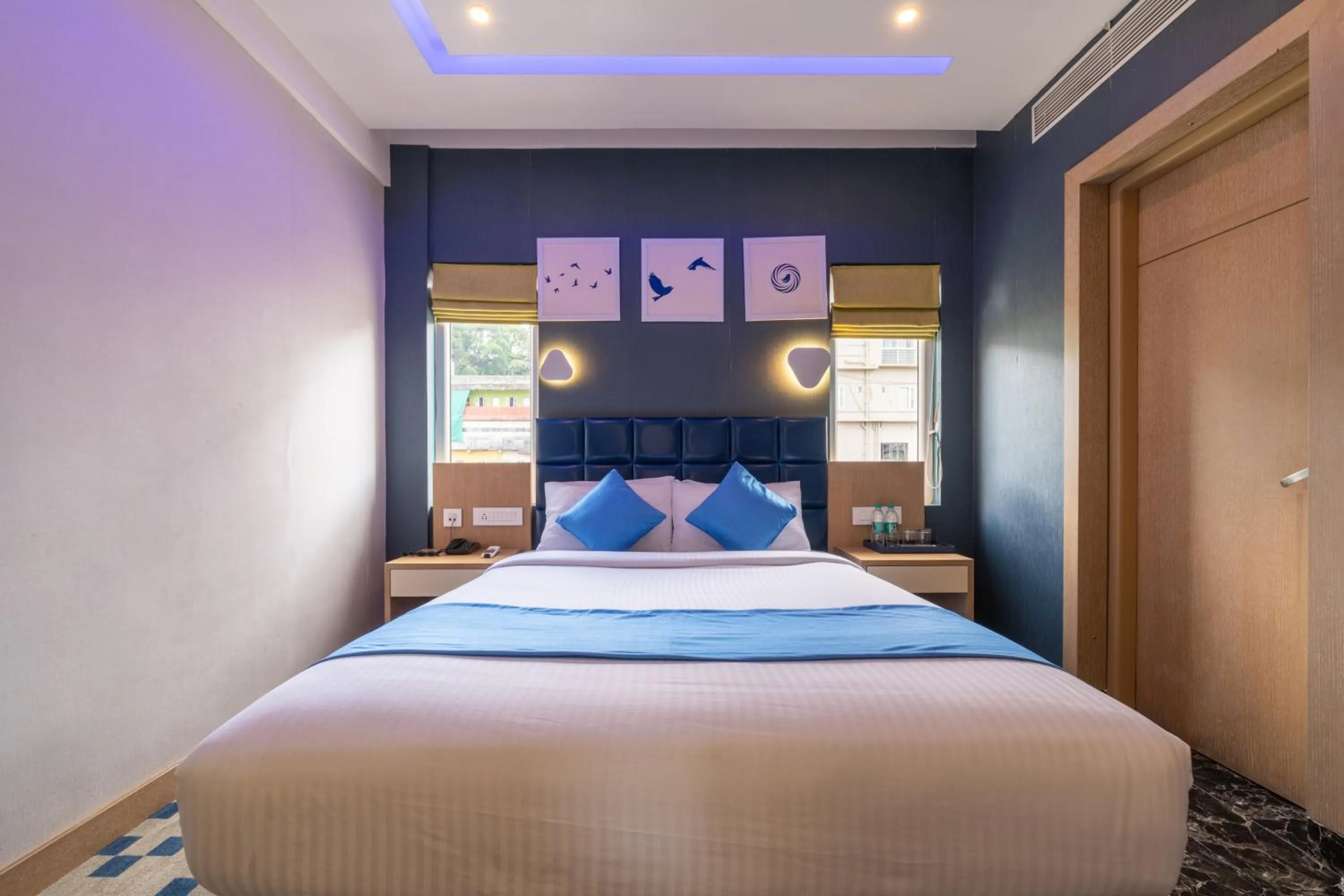 Bed in Mintotel Wayanad