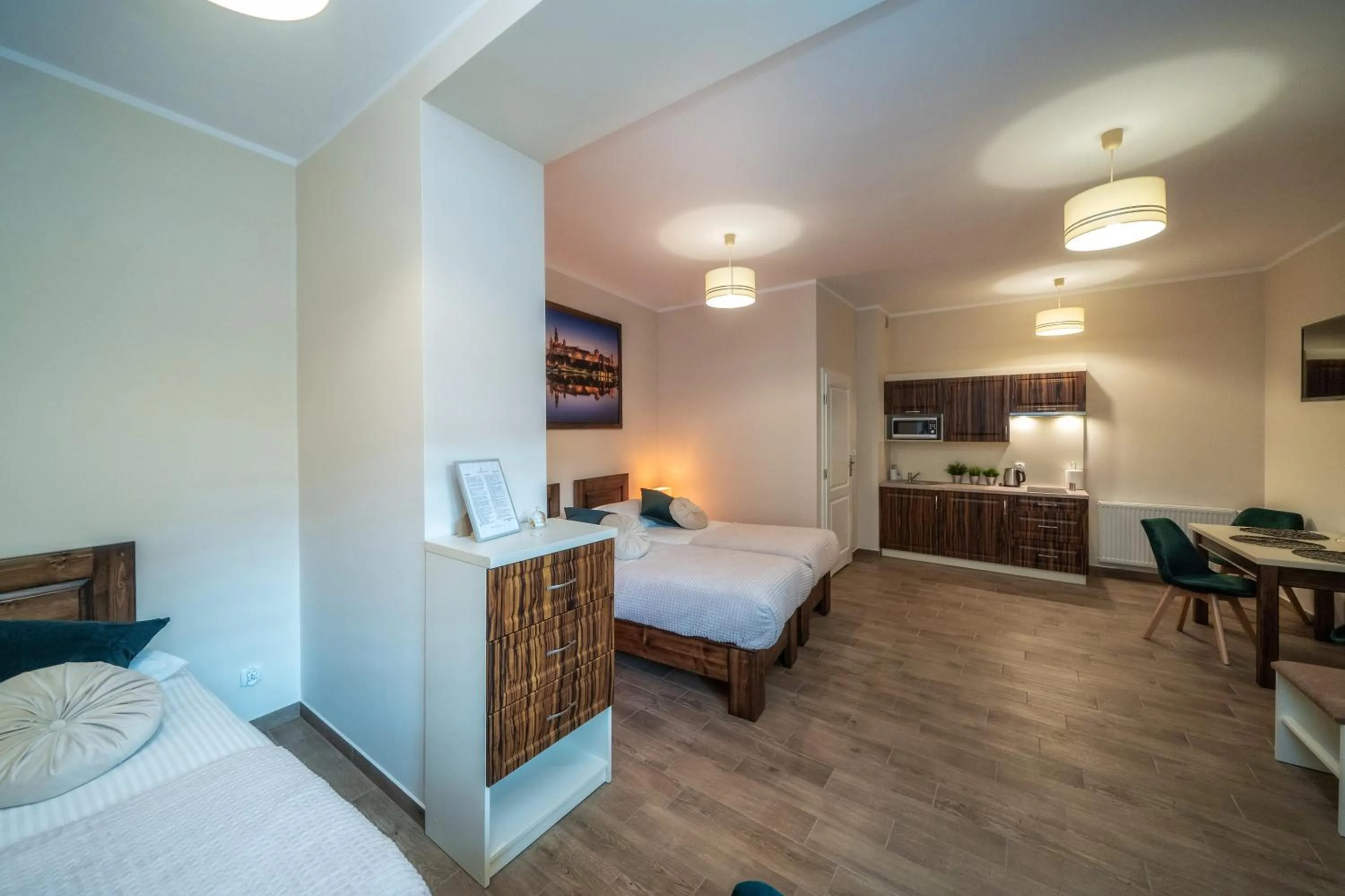 Kitchen or kitchenette, Bed in Apartments 17 Szewska