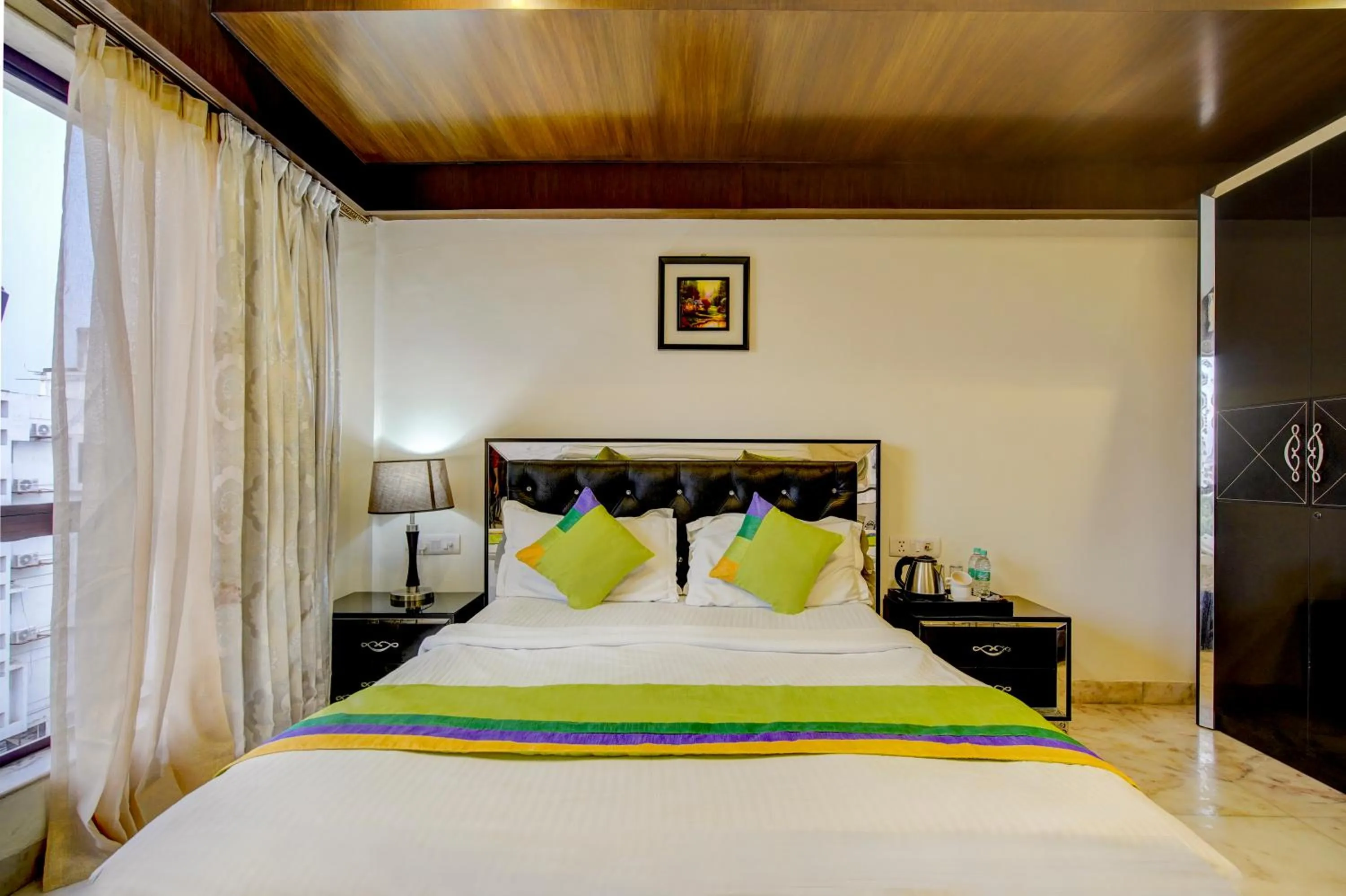 Bedroom, Bed in Treebo Soho Newtown Near New Town Bus Stand