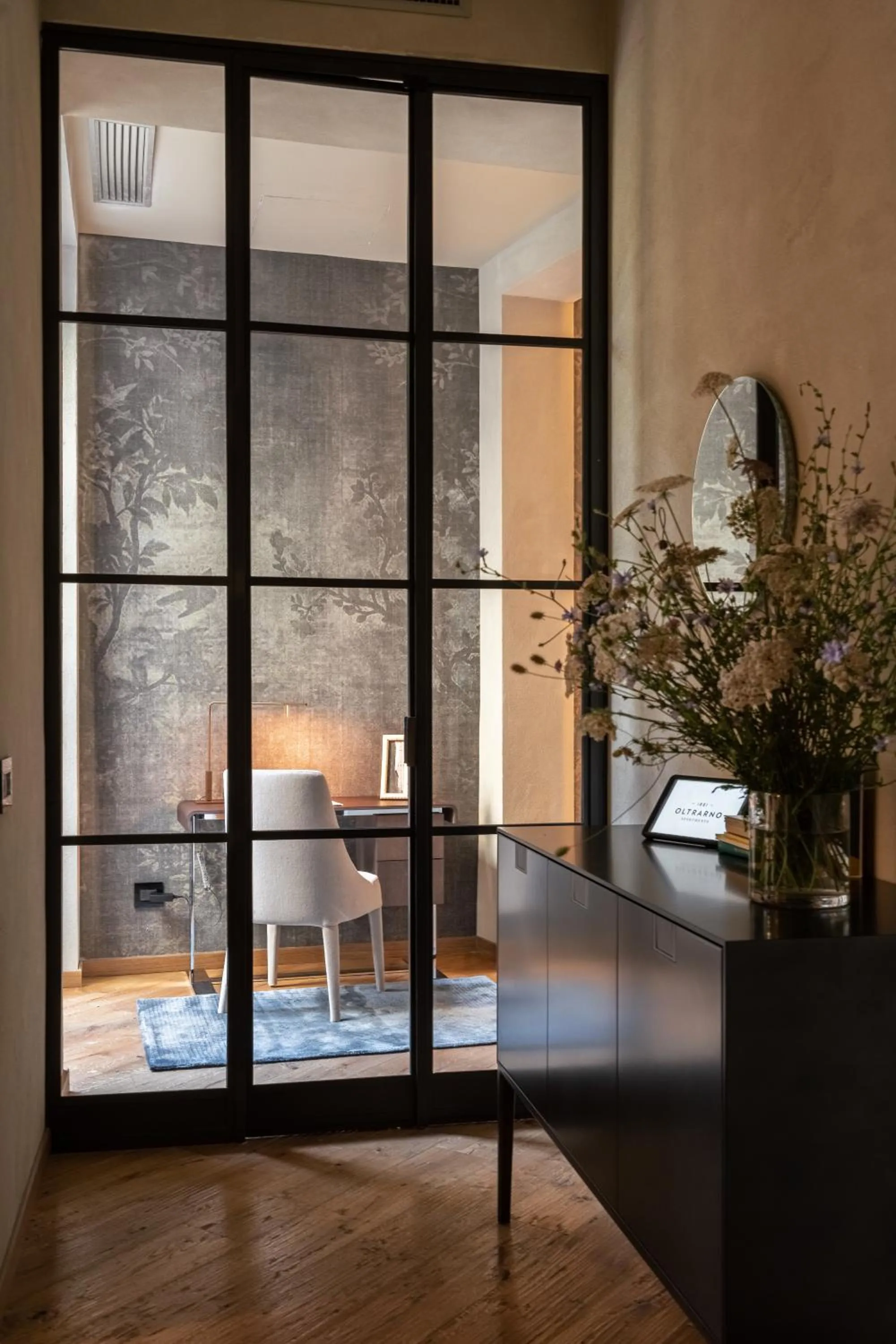 Seating area in Oltrarno 1881 Apartments