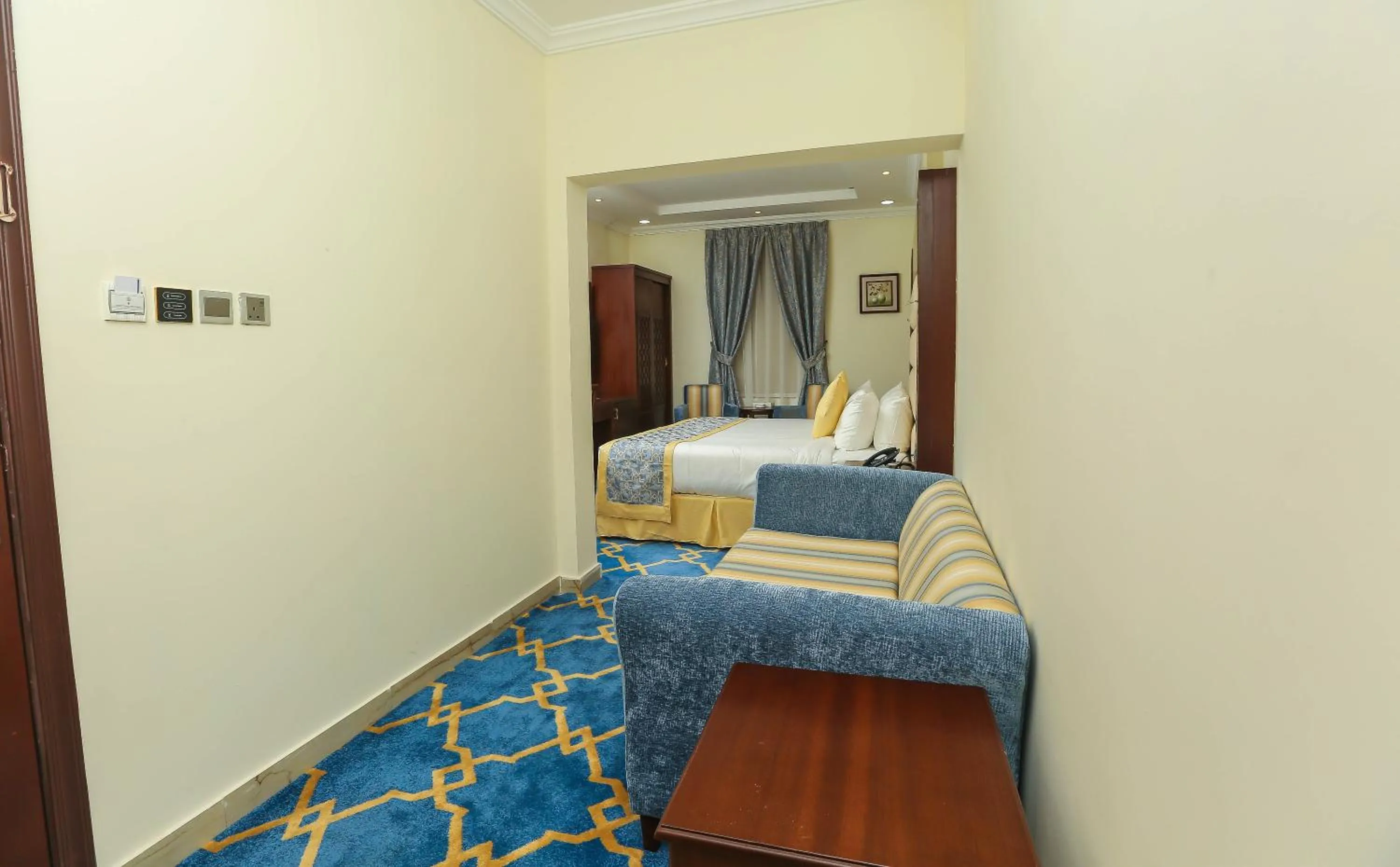 Seating area, Bed in Jeddah Oasis Hotel