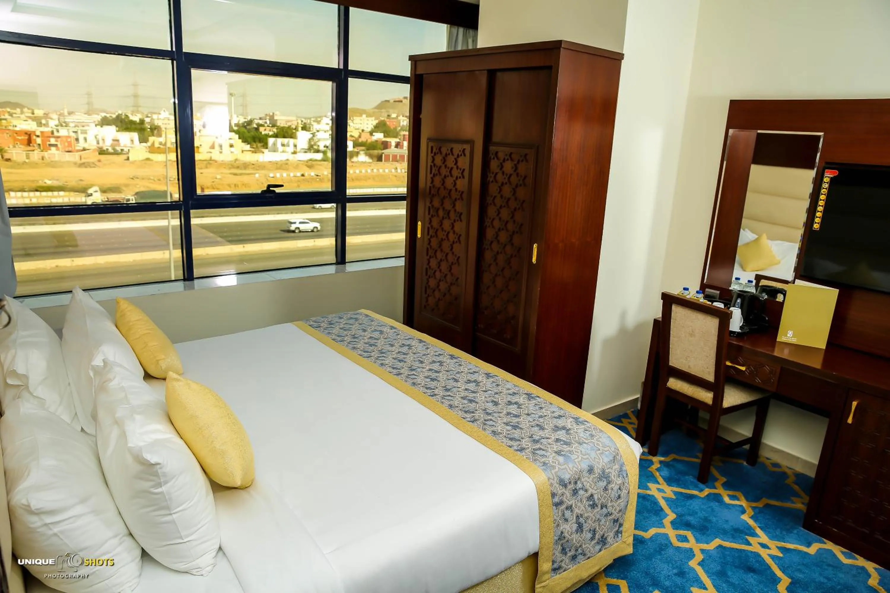 Bed in Jeddah Oasis Hotel