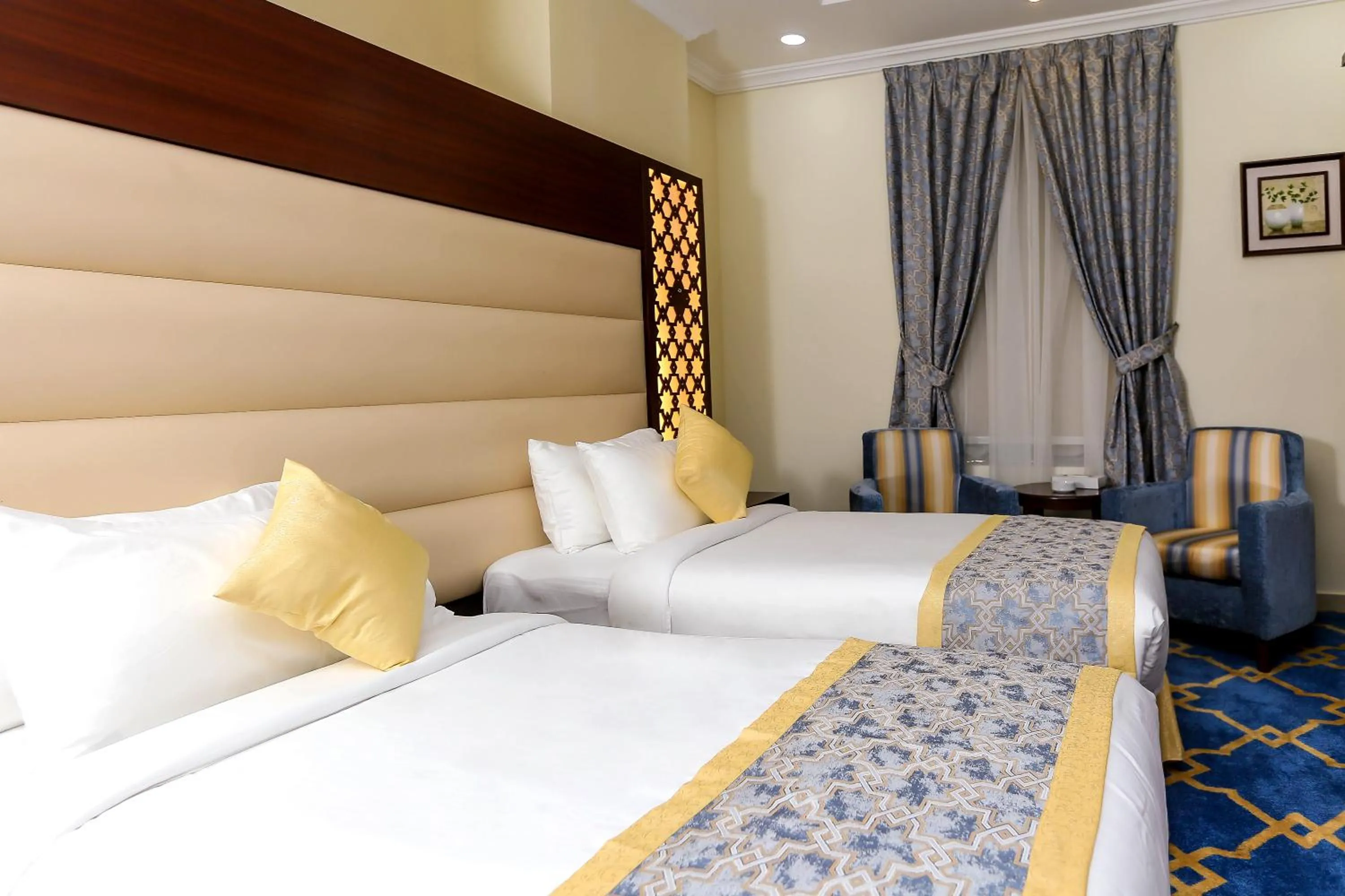 Bed in Jeddah Oasis Hotel