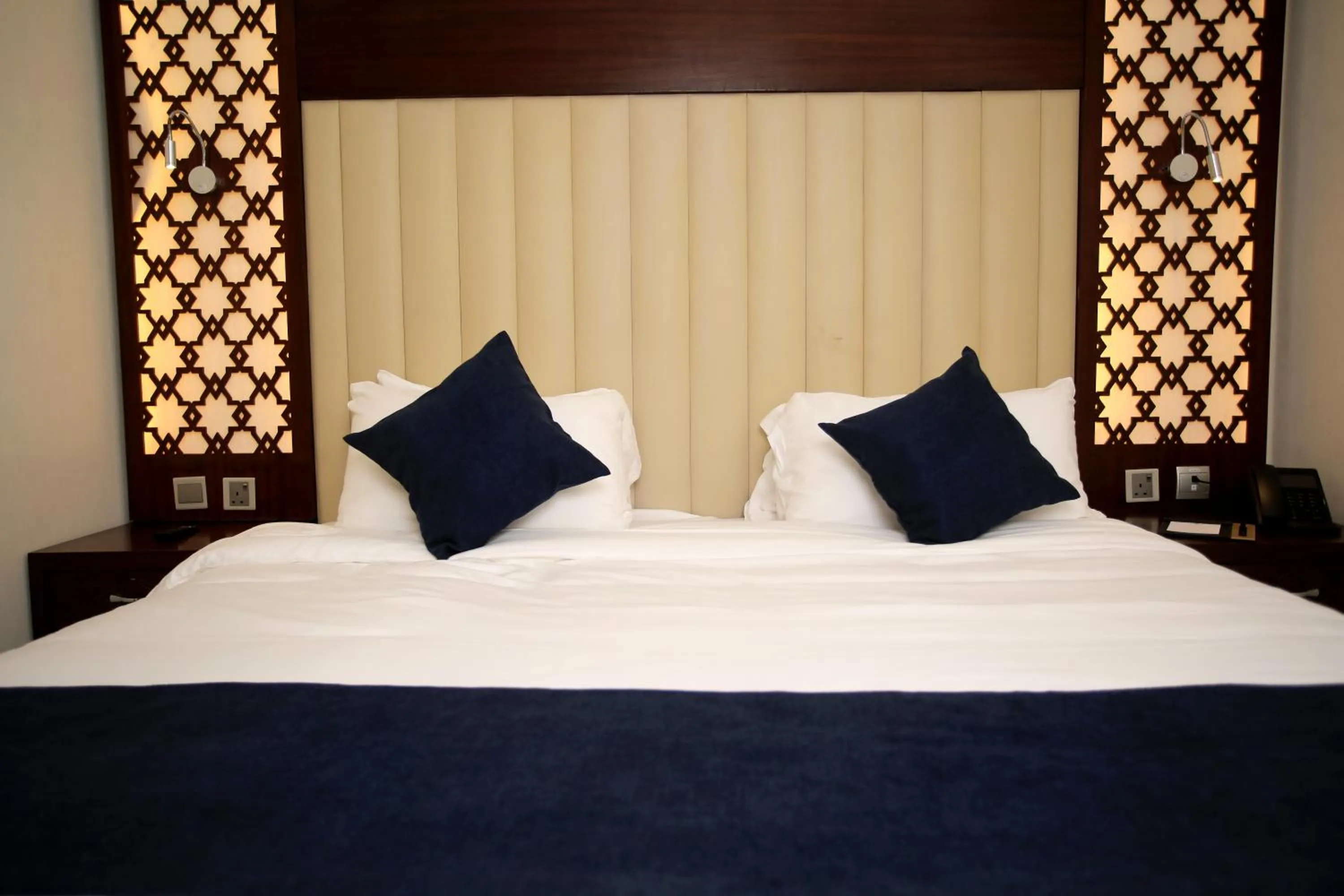 Bed in Jeddah Oasis Hotel