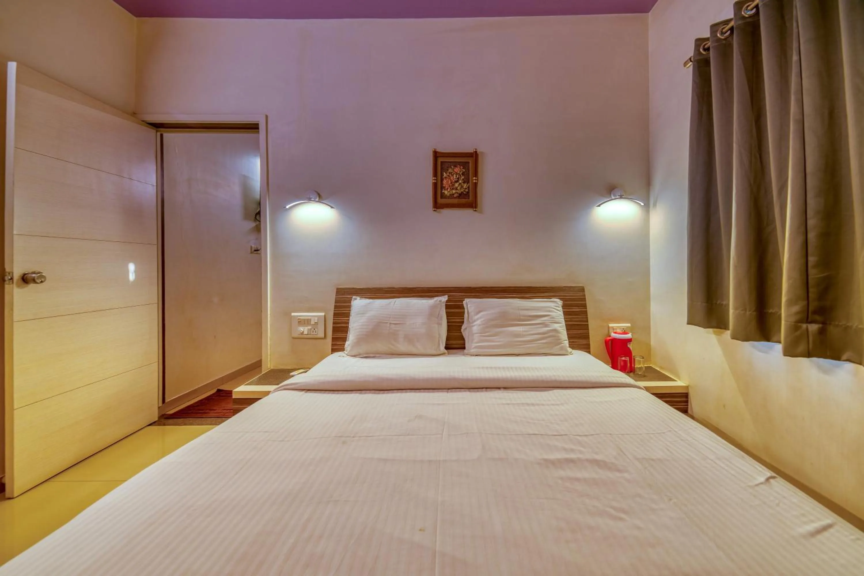 Bed in Hotel Grand Ashwin