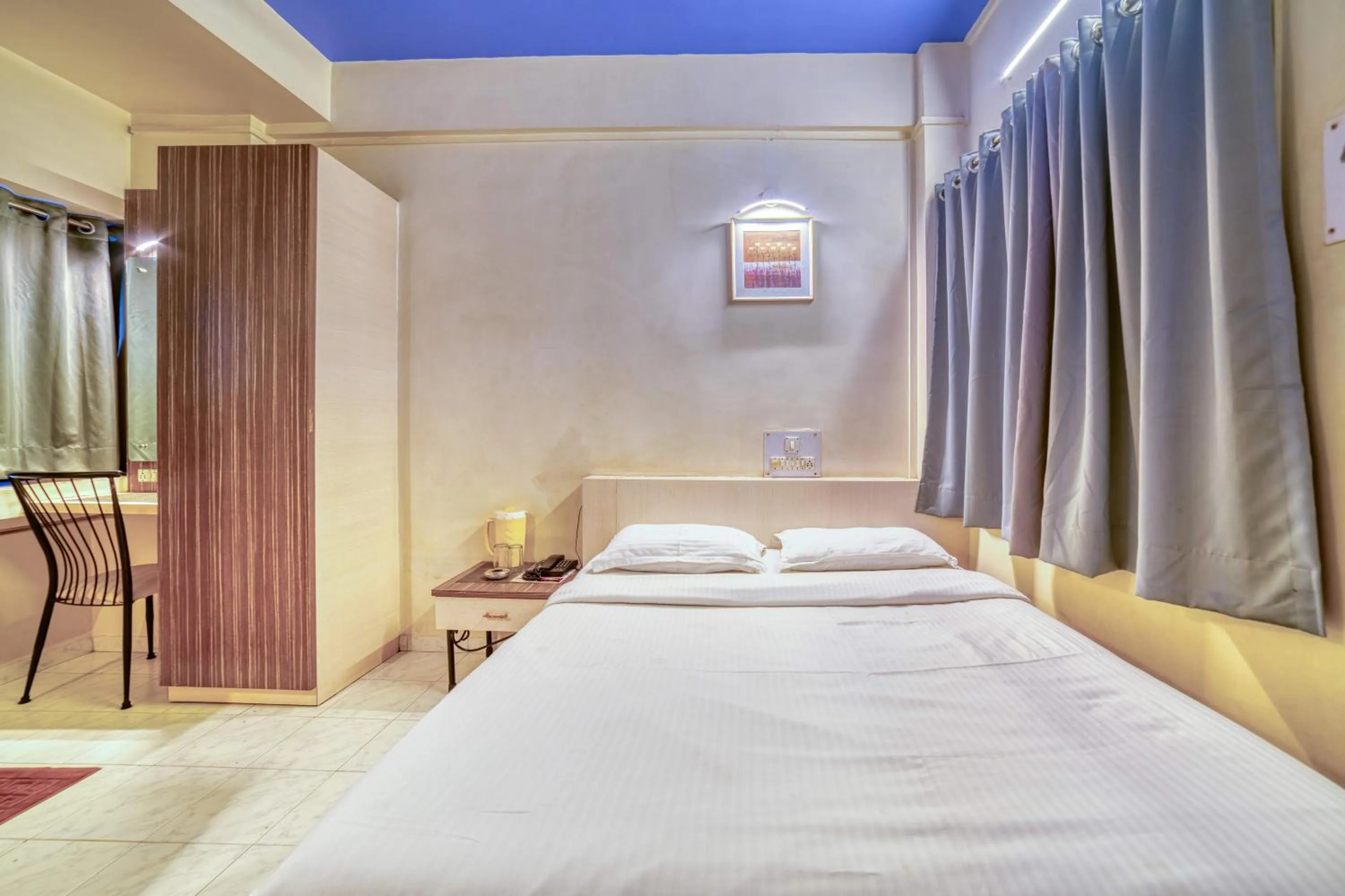 Bed in Hotel Grand Ashwin