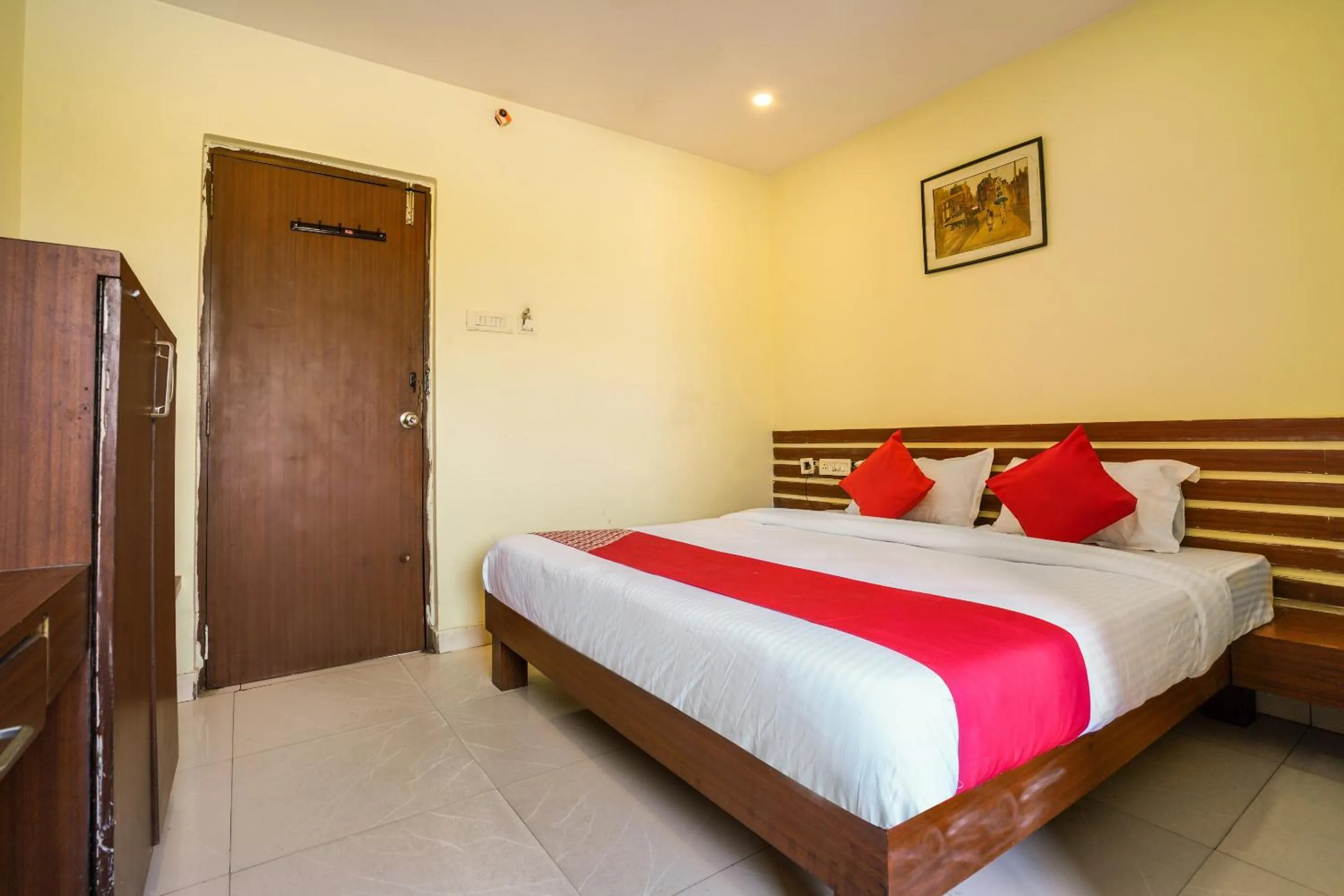 Bedroom in Hotel O Pariwar Inn
