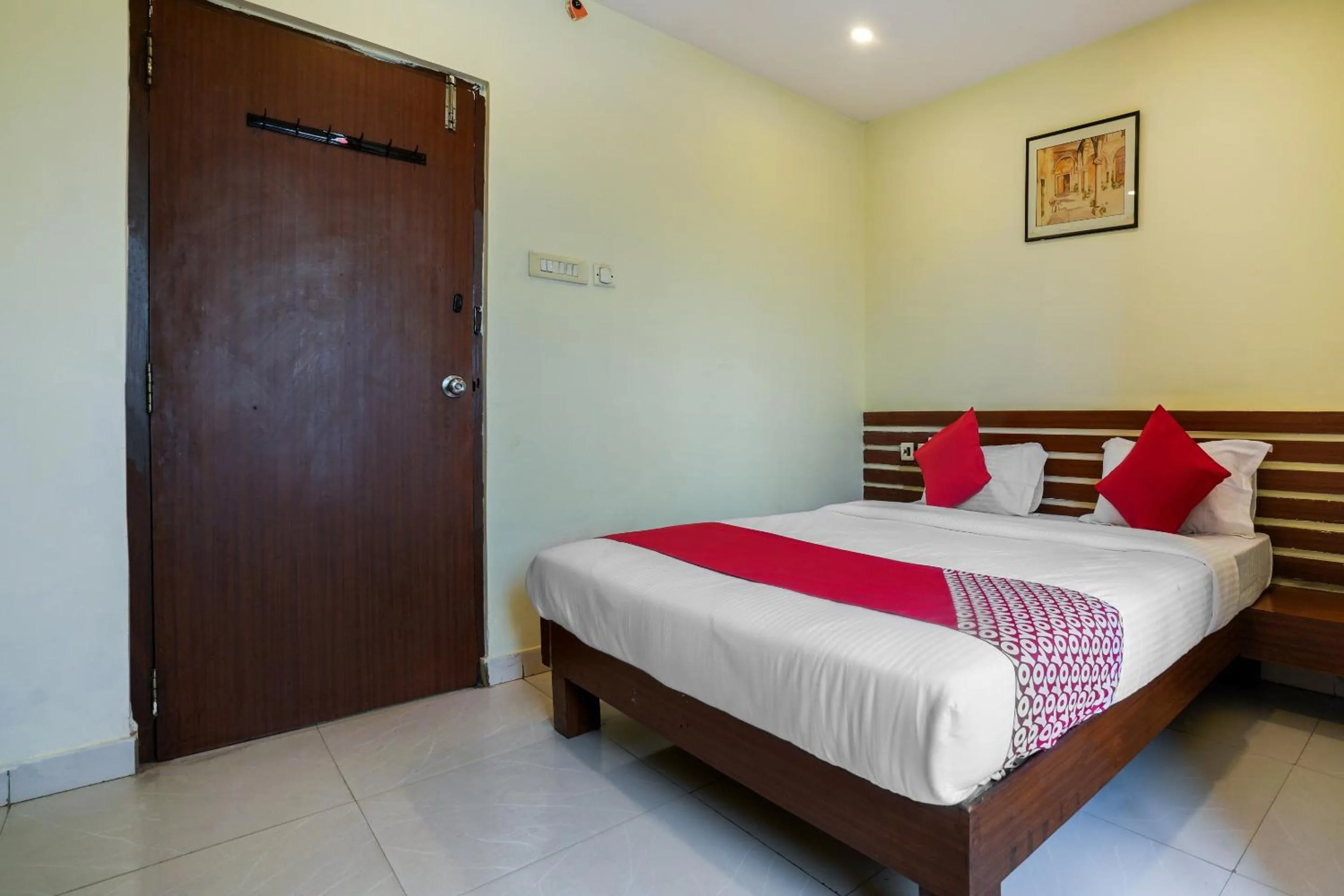 Bedroom in Hotel O Pariwar Inn