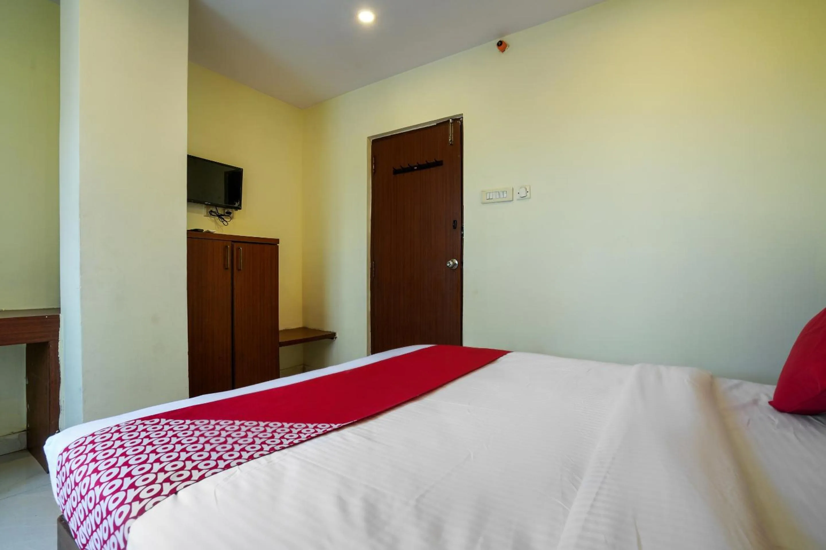 Bedroom in Hotel O Pariwar Inn