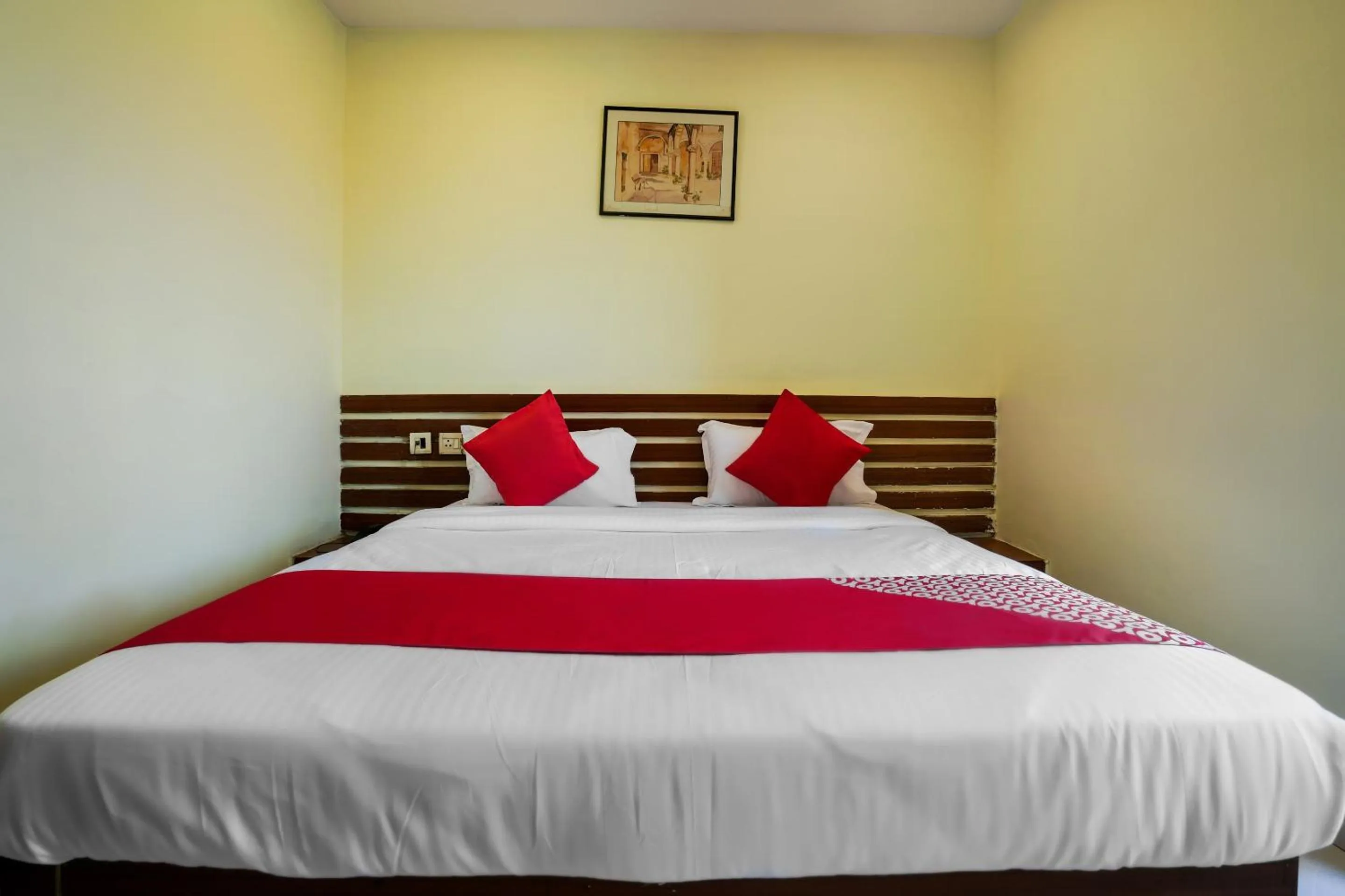 Bedroom in Hotel O Pariwar Inn