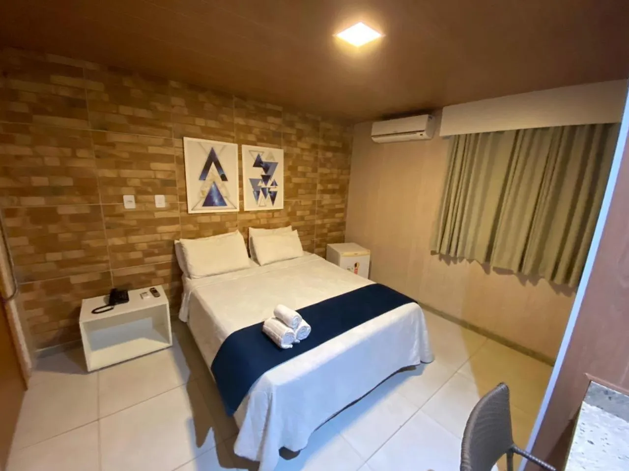 Bed in Farol Plaza Hotel