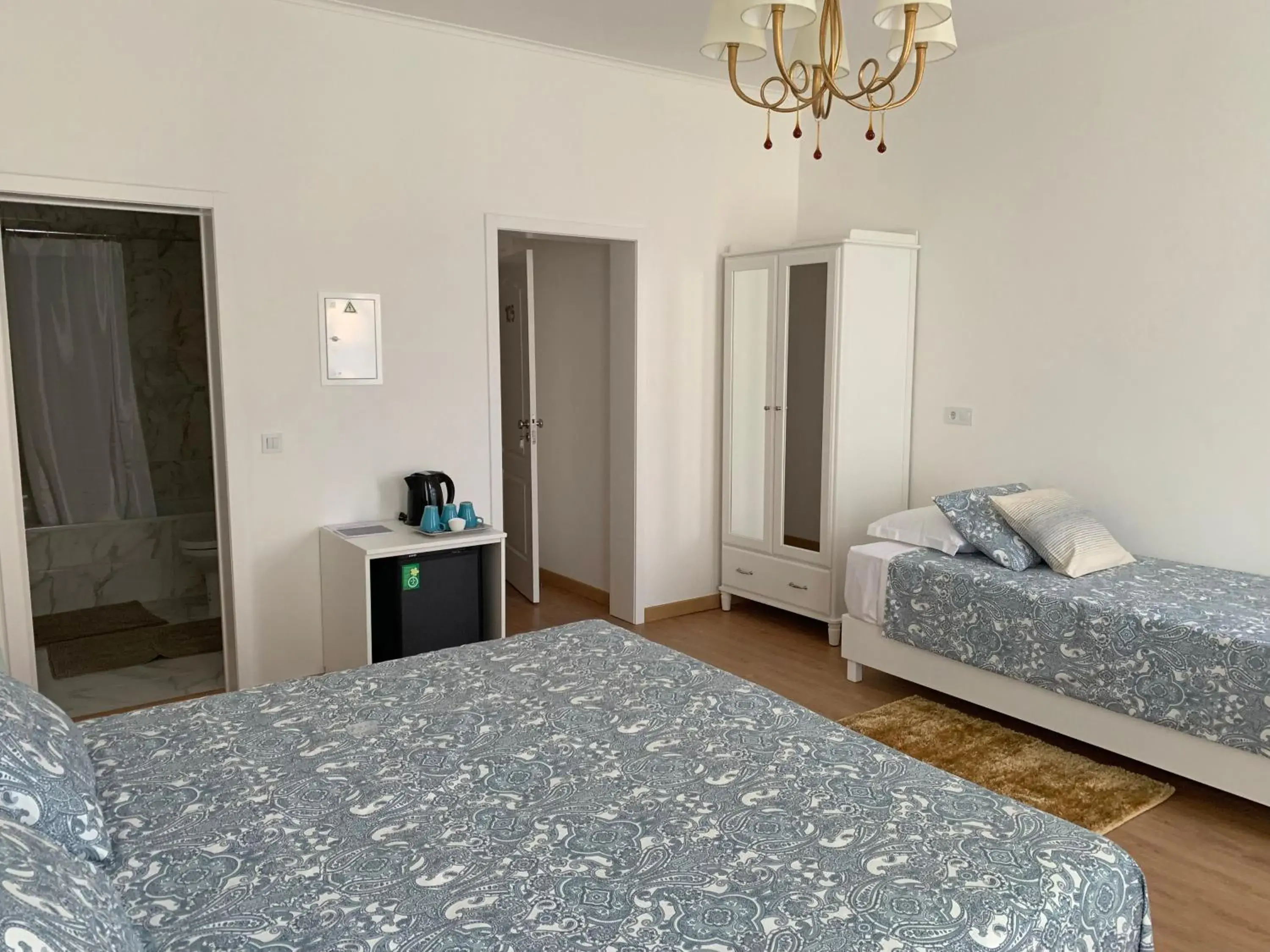 Triple Room with Private Bathroom in Safira Triple Room with Private Bathroom in Safira