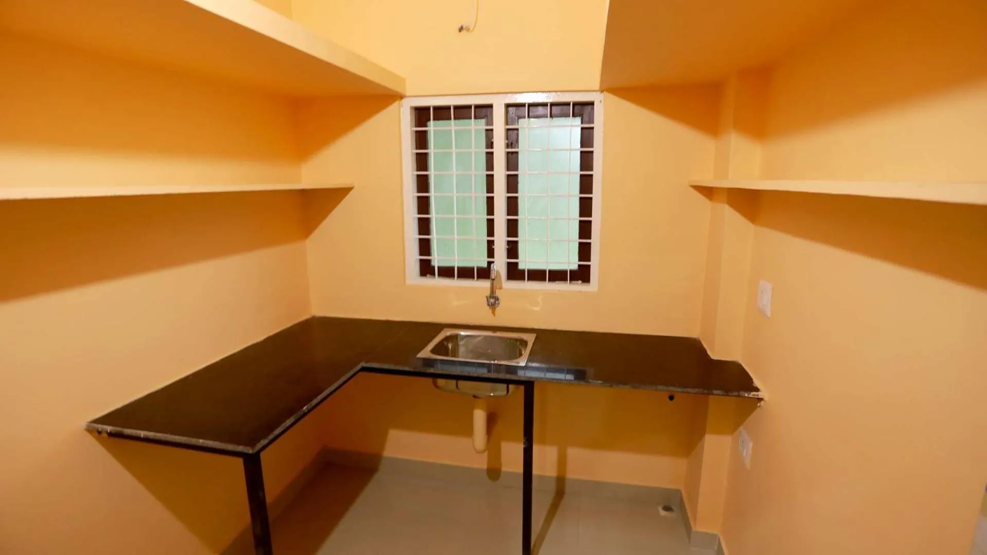 Kitchen or kitchenette in Base9 Cochin Airport Hotel