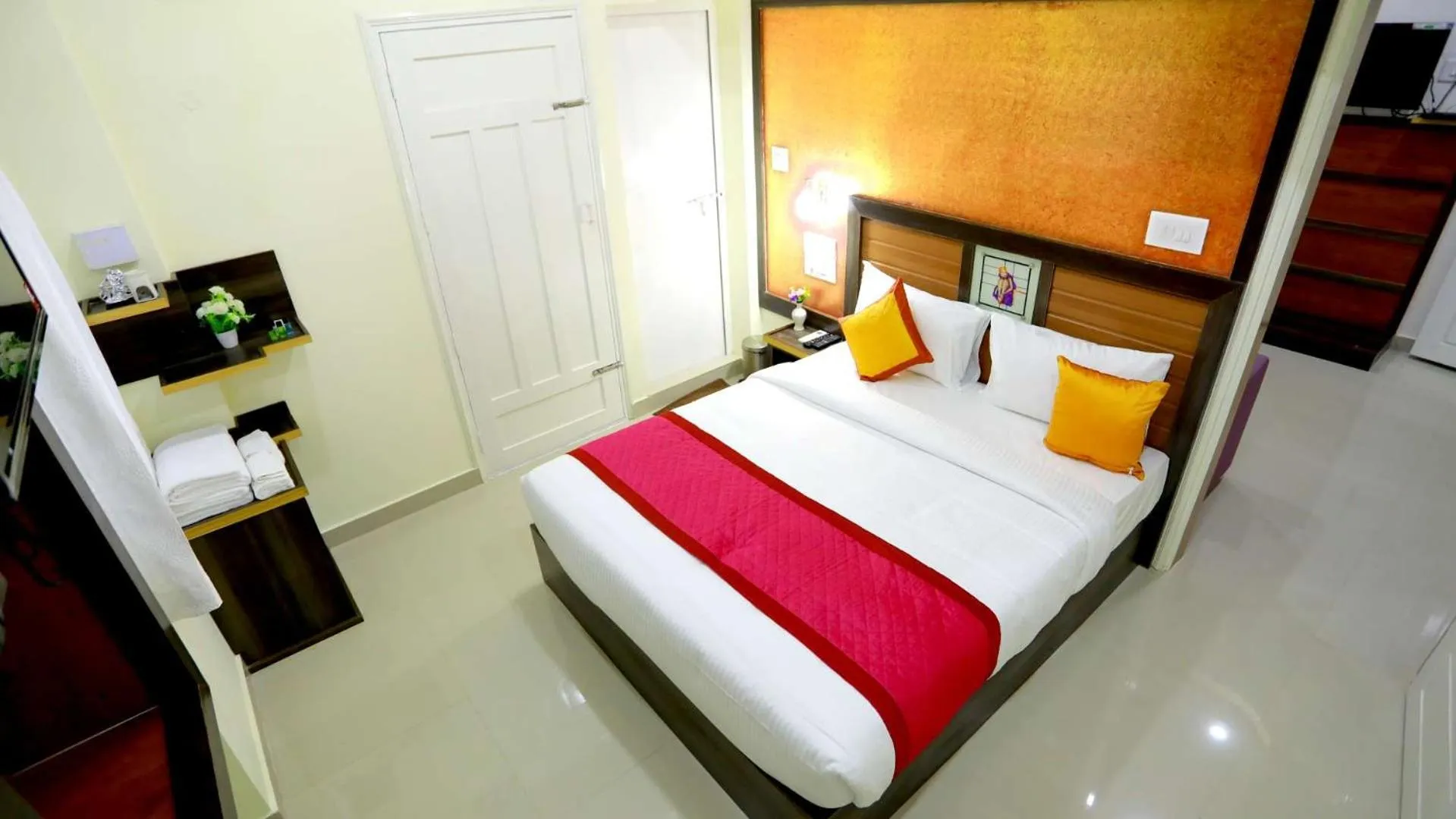 Bed in Base9 Cochin Airport Hotel