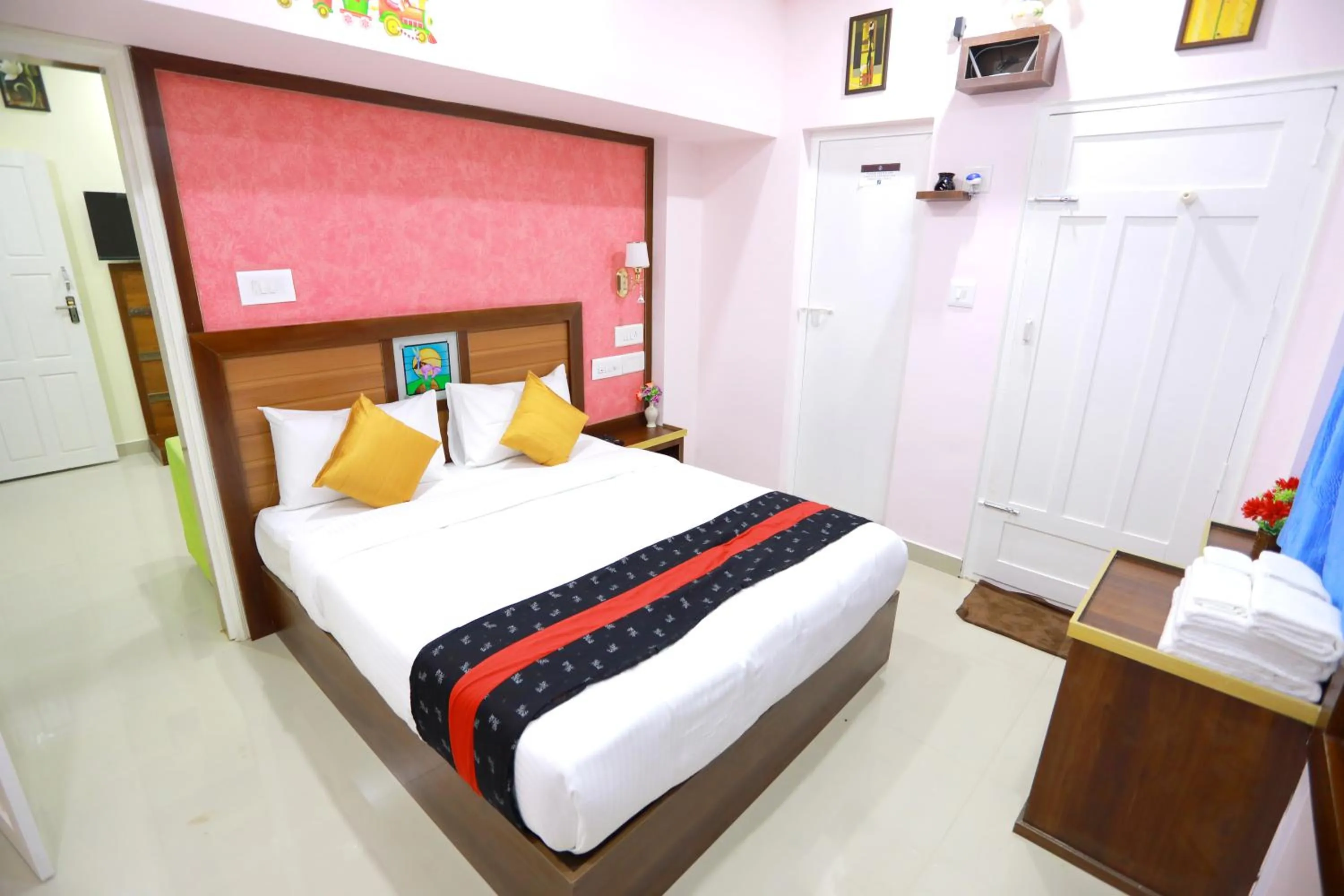 Photo of the whole room, Bed in Base9 Cochin Airport Hotel