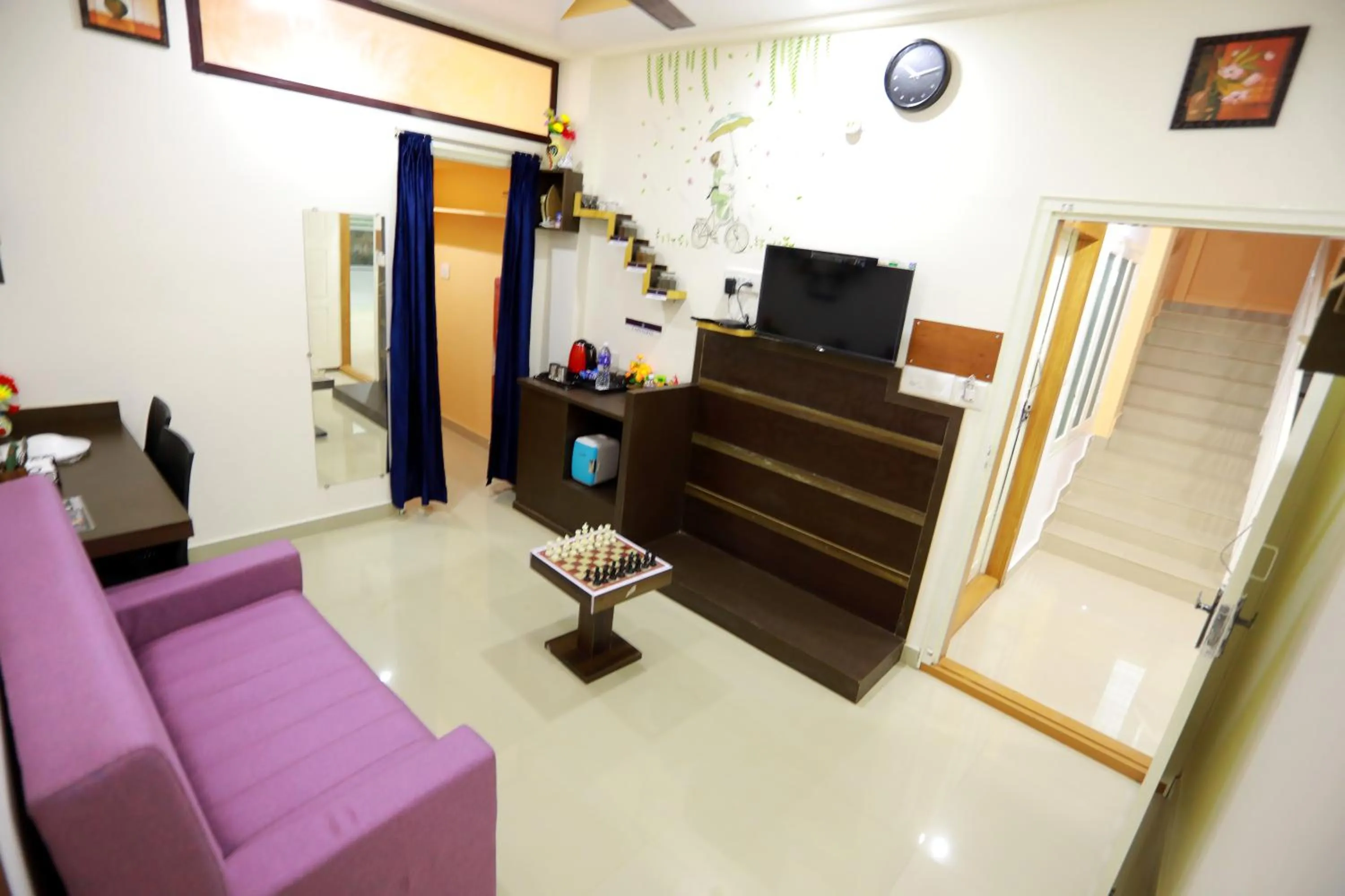 TV and multimedia in Base9 Cochin Airport Hotel