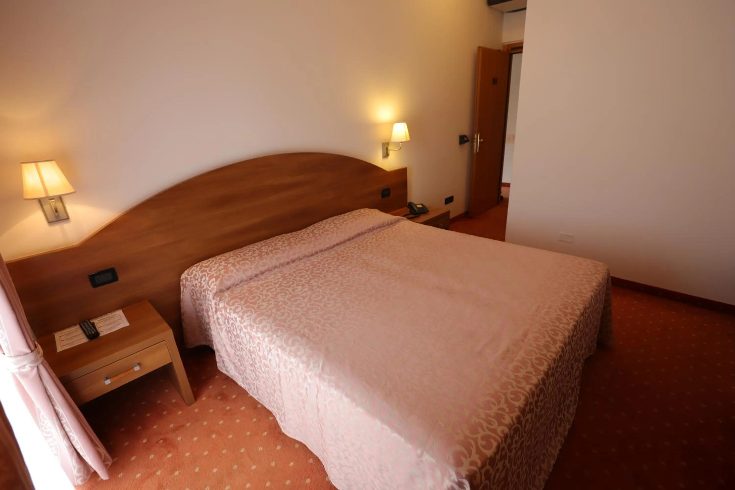 Bed in Hotel da Roberto