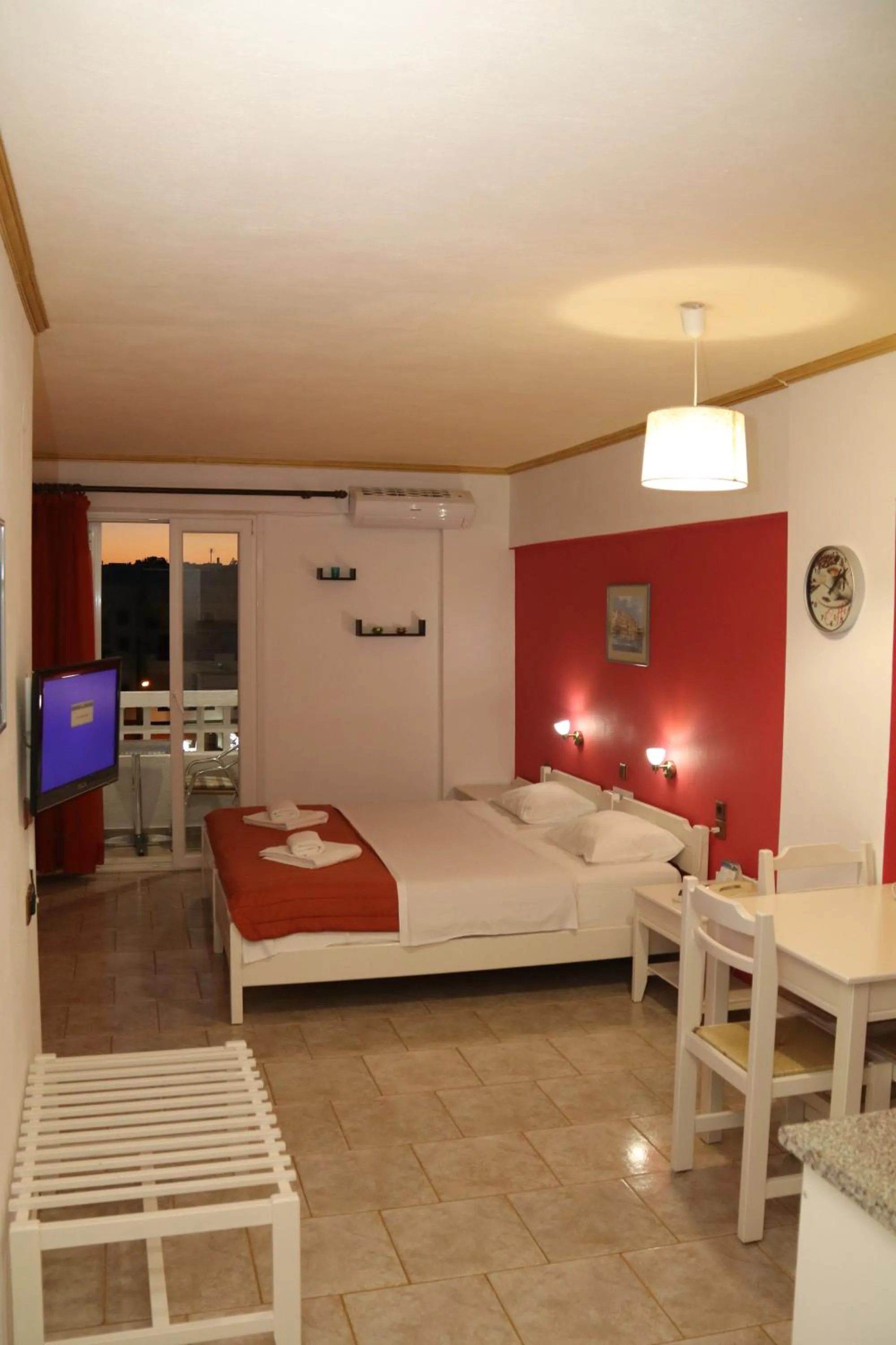 Photo of the whole room, Bed in Aris Studios