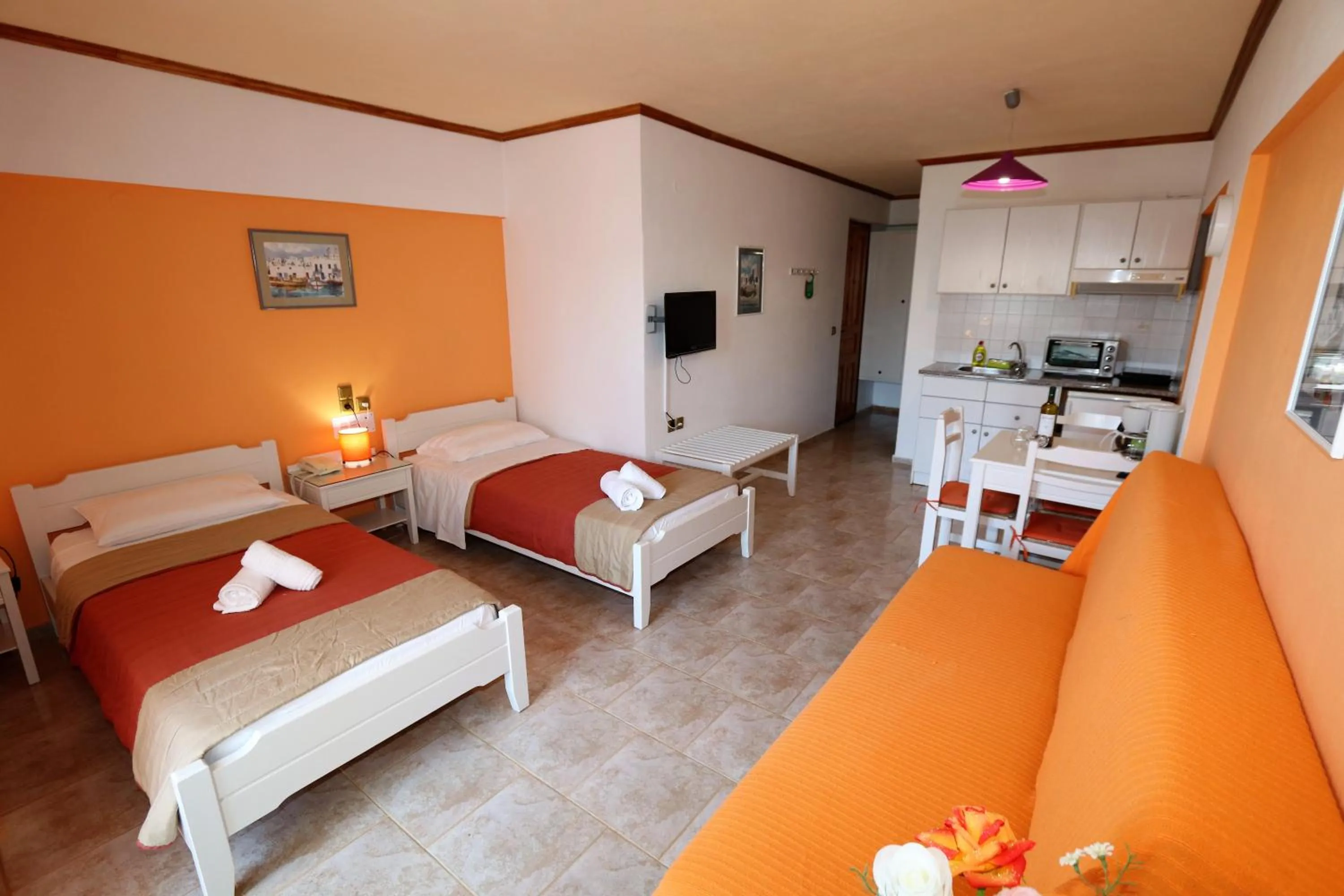 Photo of the whole room, Bed in Aris Studios