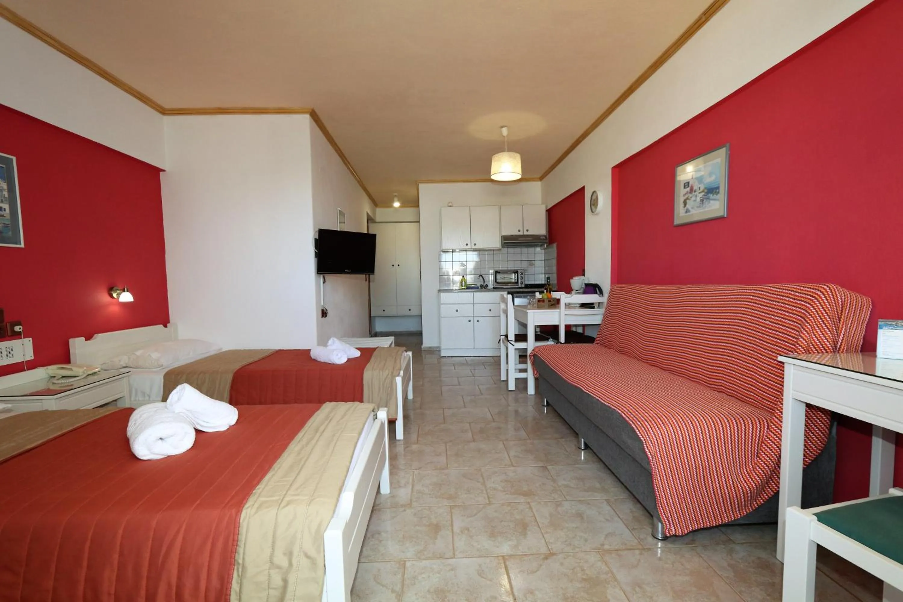 Photo of the whole room, Bed in Aris Studios