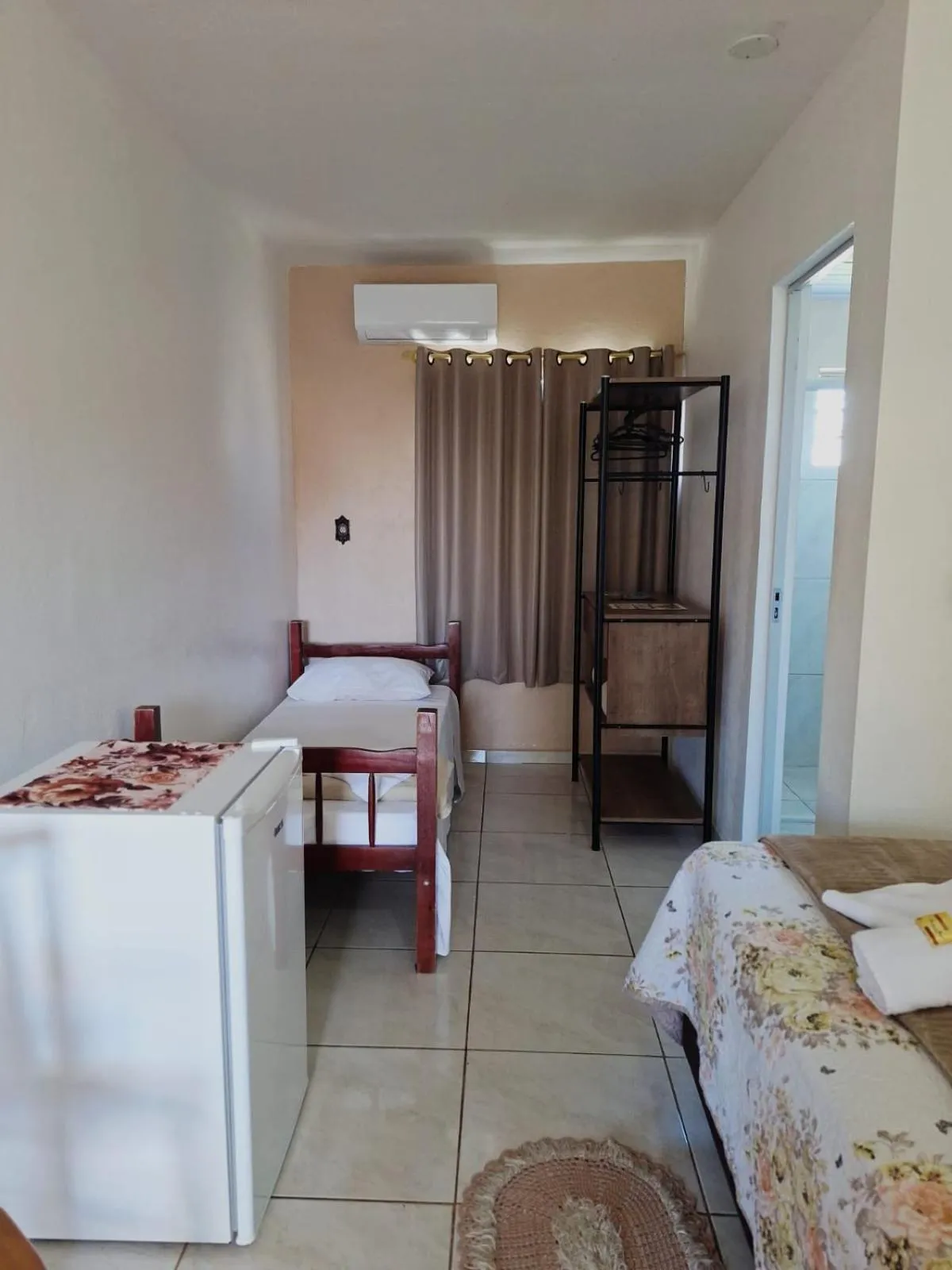 Bed in Pousada Alegria do Cowboy