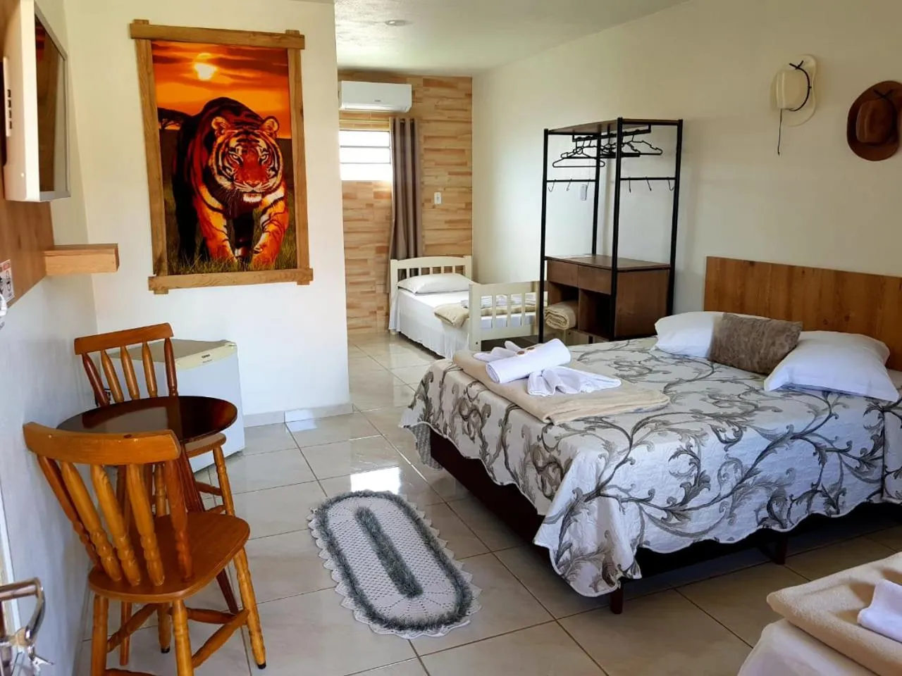 Bed in Pousada Alegria do Cowboy