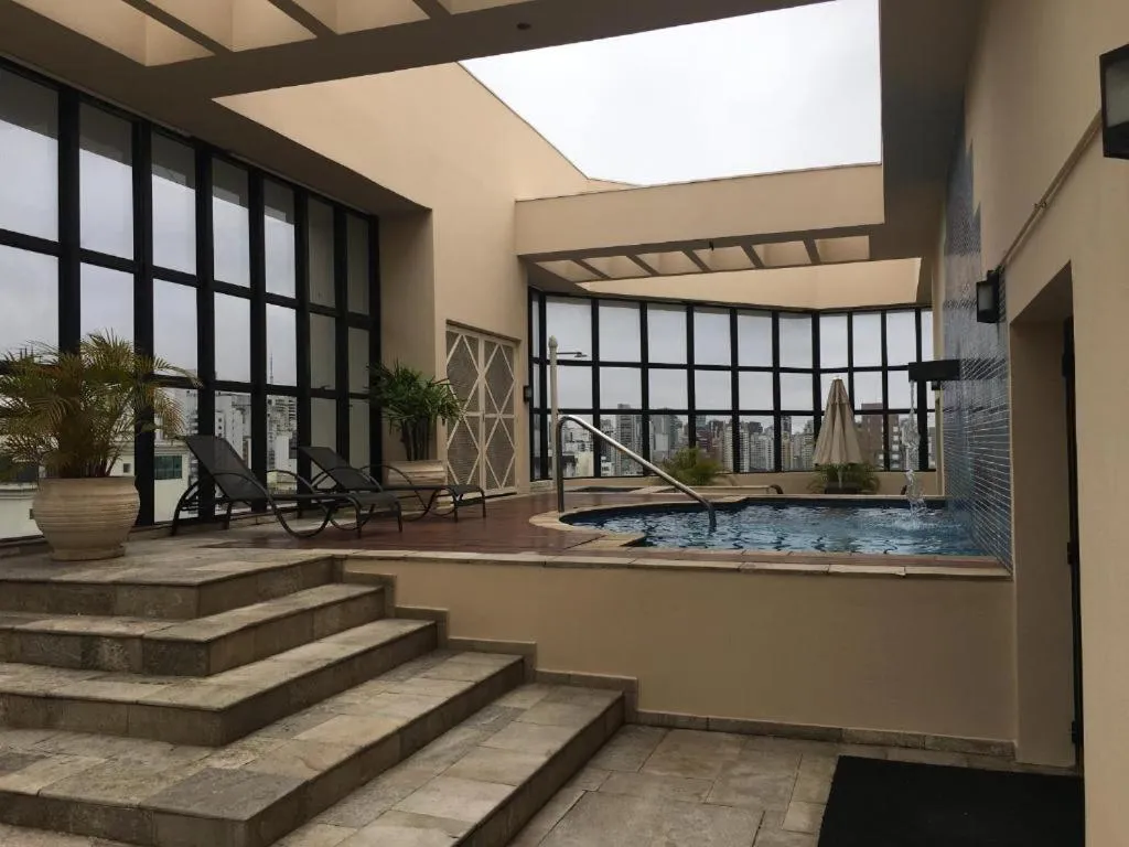 Swimming pool in Flat Alameda Lorena - Prédio Ninety - Jardim Paulista