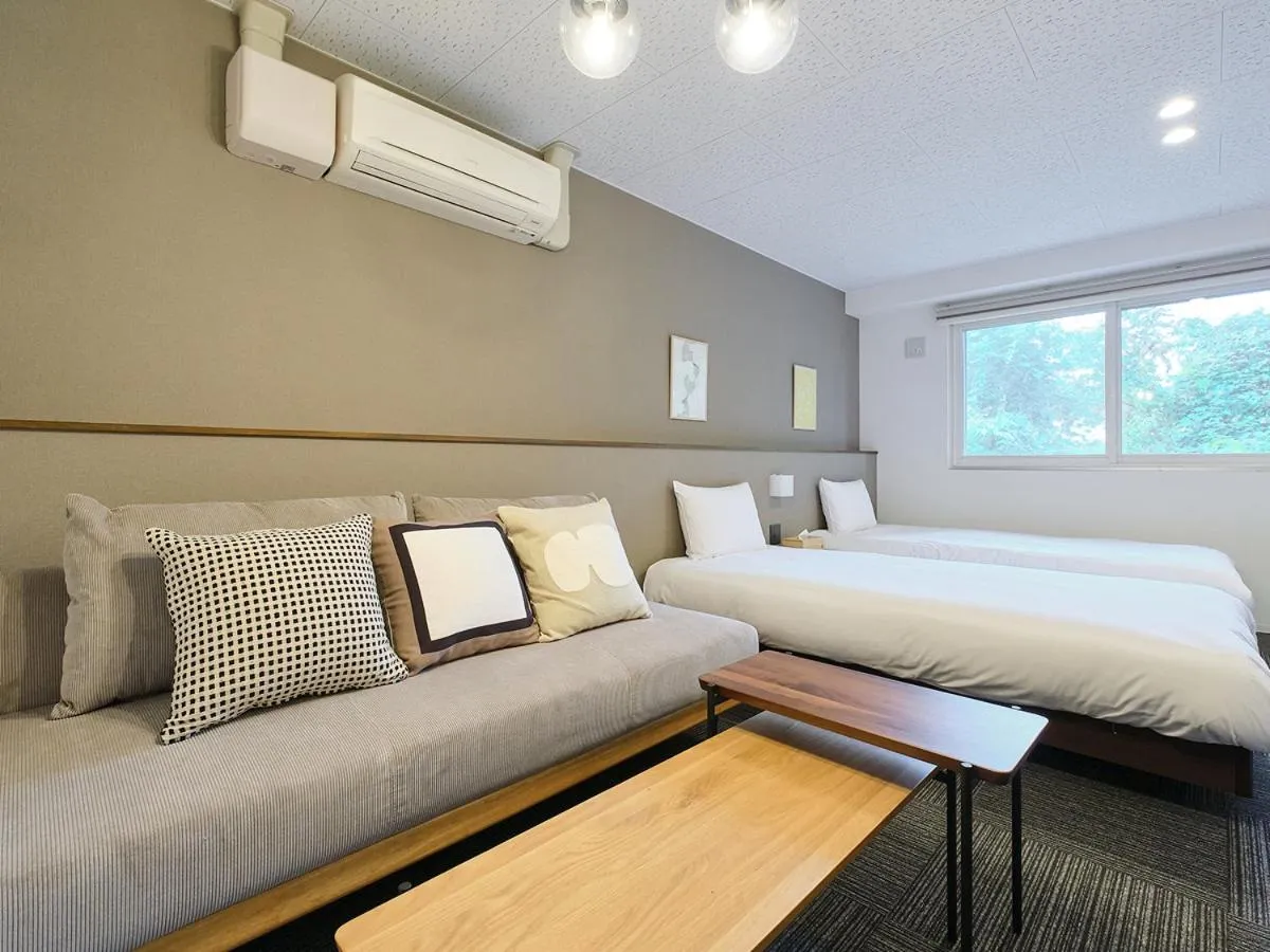 Living room, Bed in UCHI Living Stay Otaru Suitengu