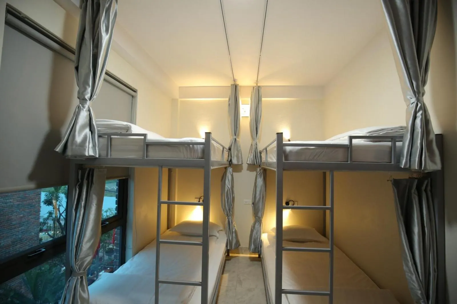 Bed in Cozynibi Hotel