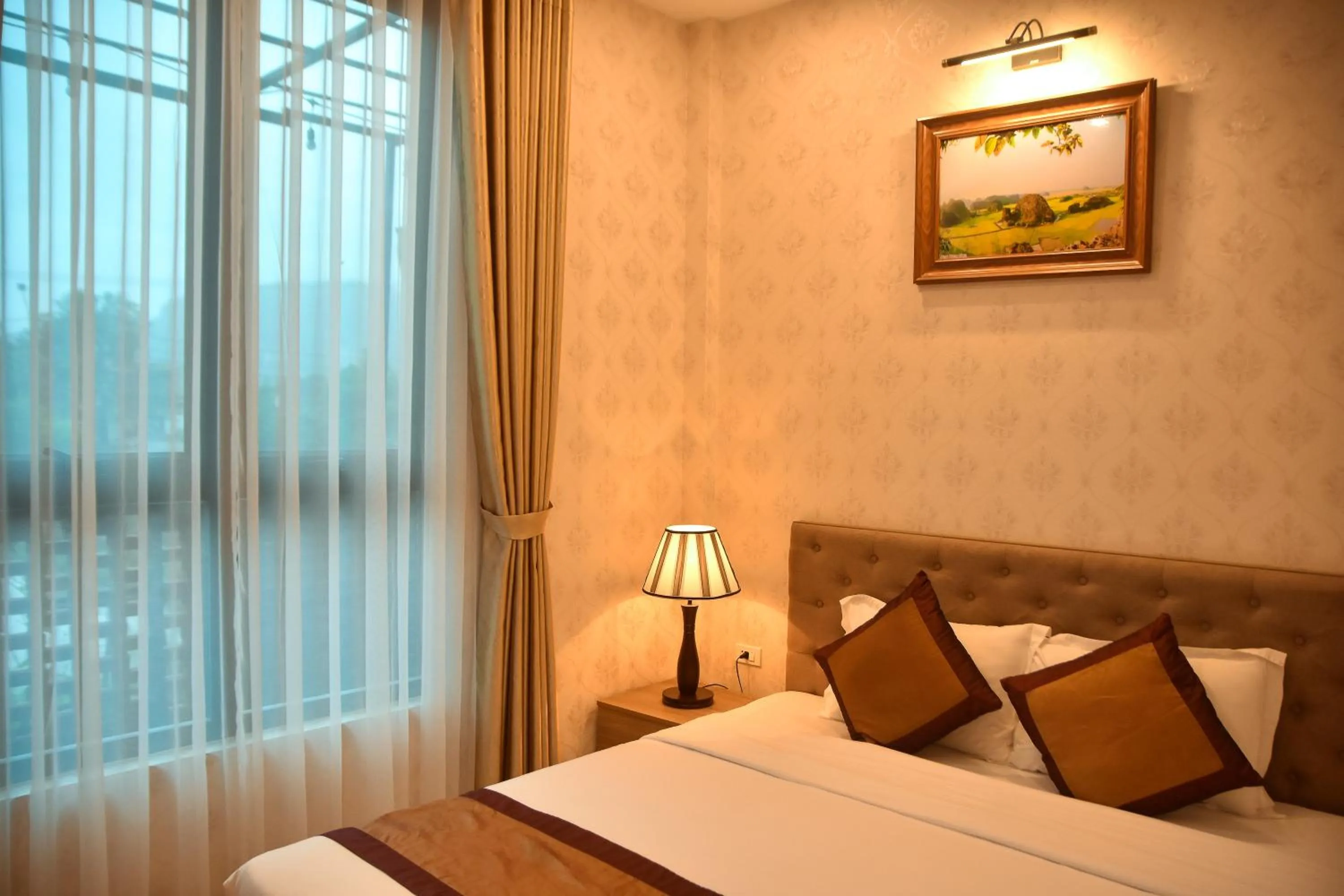 Bed in Cozynibi Hotel