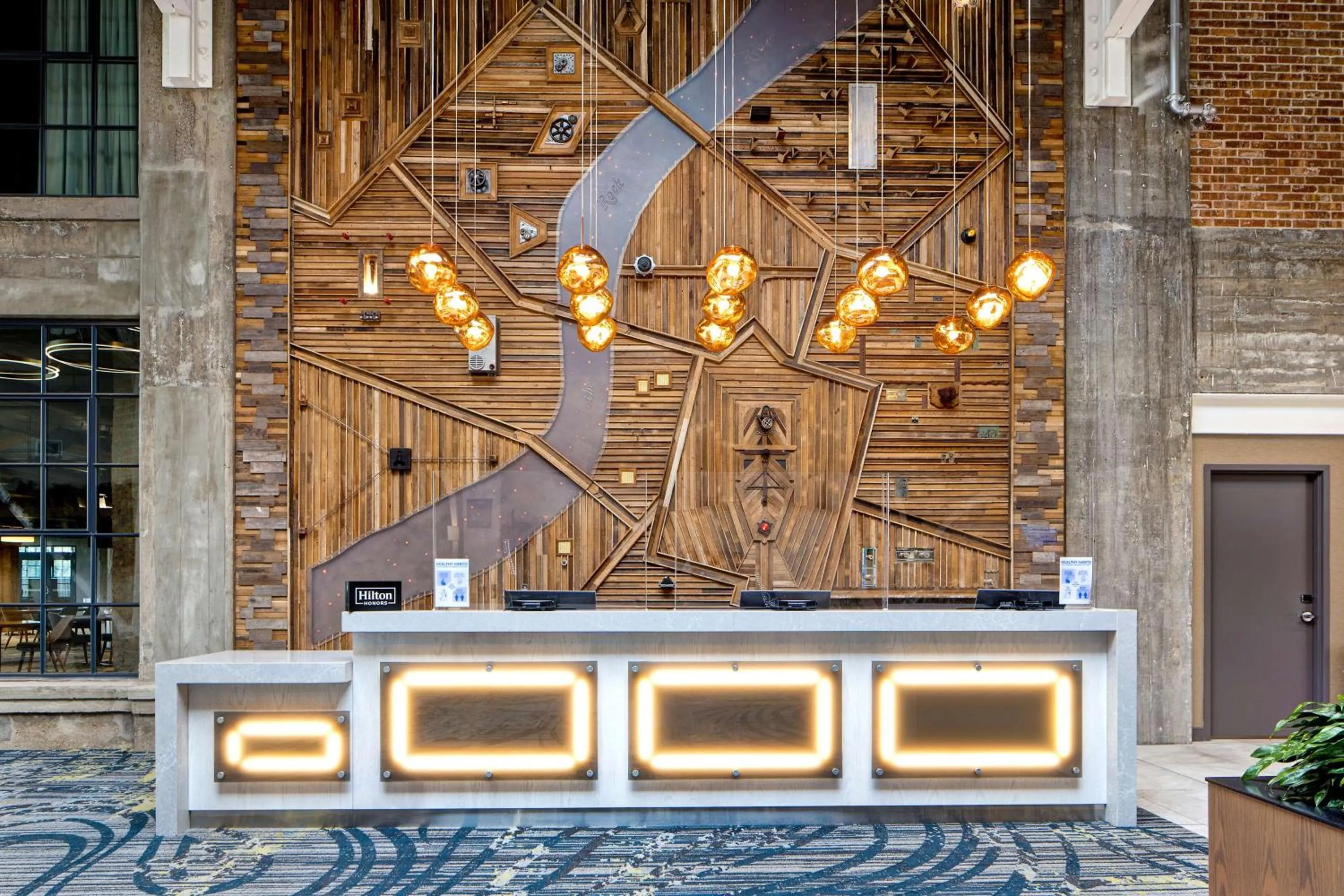 Lobby or reception in Embassy Suites By Hilton Rockford Riverfront