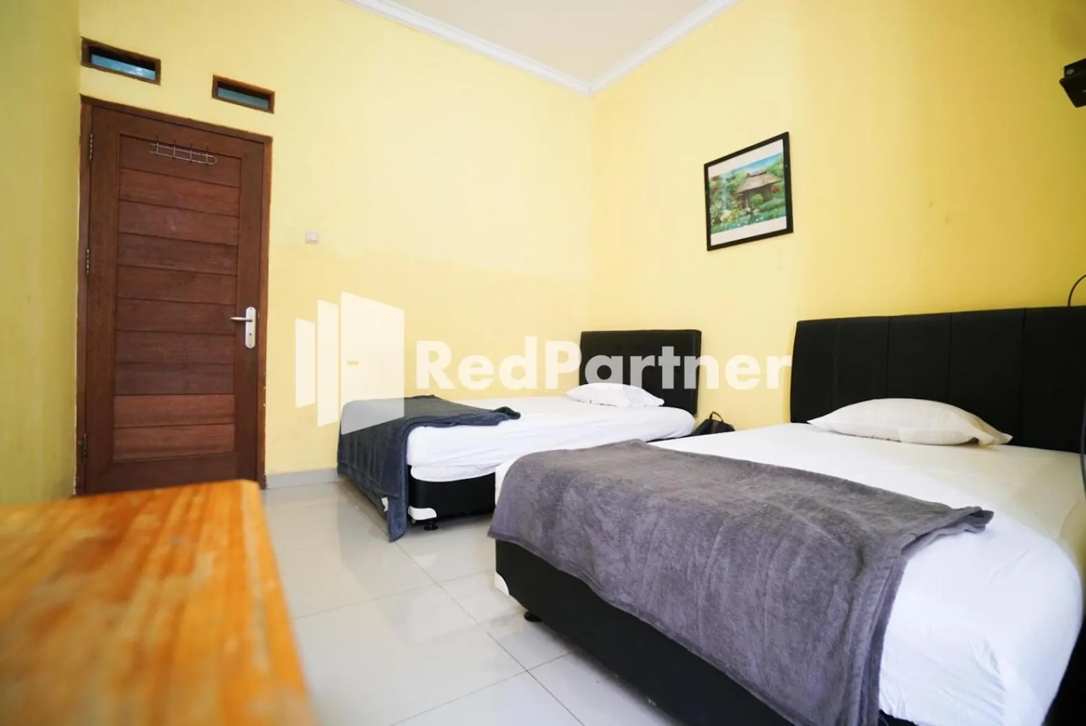 Bedroom, Bed in Surabaya Jaya Hotel near Soekarno Hatta Airport Redpartner