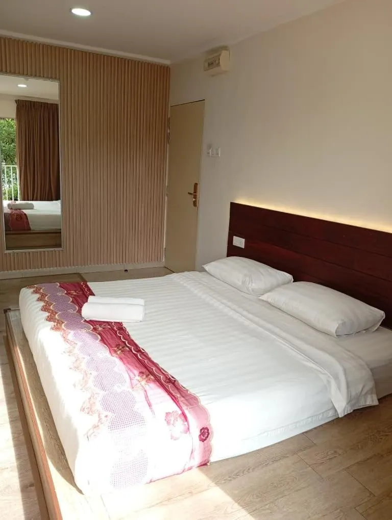 Bed in Mass Boutique Hotel