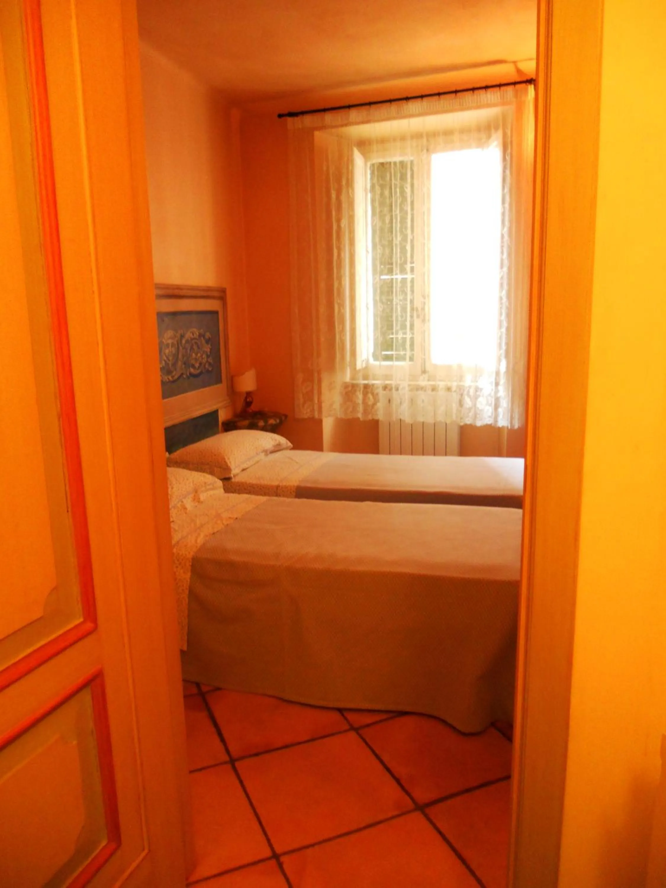 Bedroom in Locanda di Porta Antica